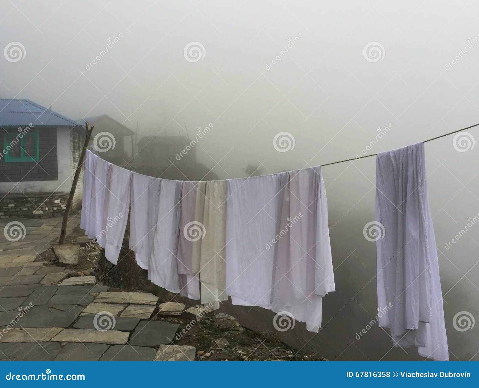 Drying White Cloth In The Mist, Mountain Village Stock Photo Image of