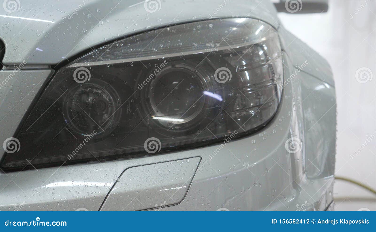 Drying of Windows after Car Washing, Drops Flow Down. Concept Drying