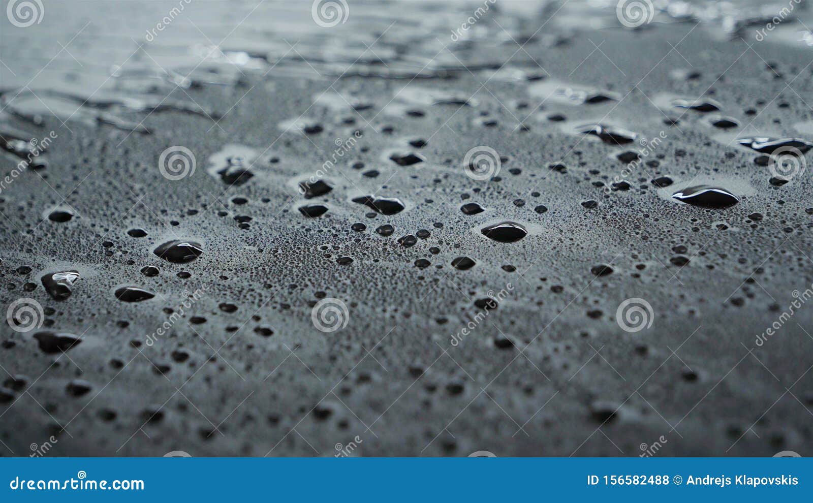 Drying of Windows after Car Washing, Drops Flow Down. Concept Drying