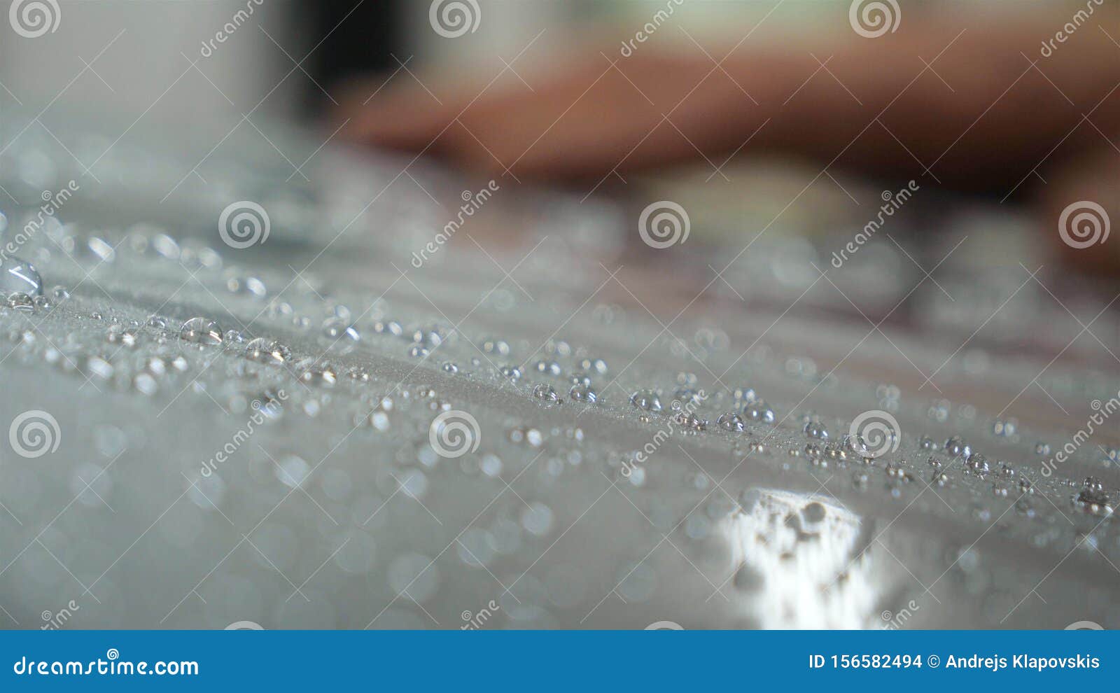 Drying of Windows after Car Washing, Drops Flow Down. Concept Drying