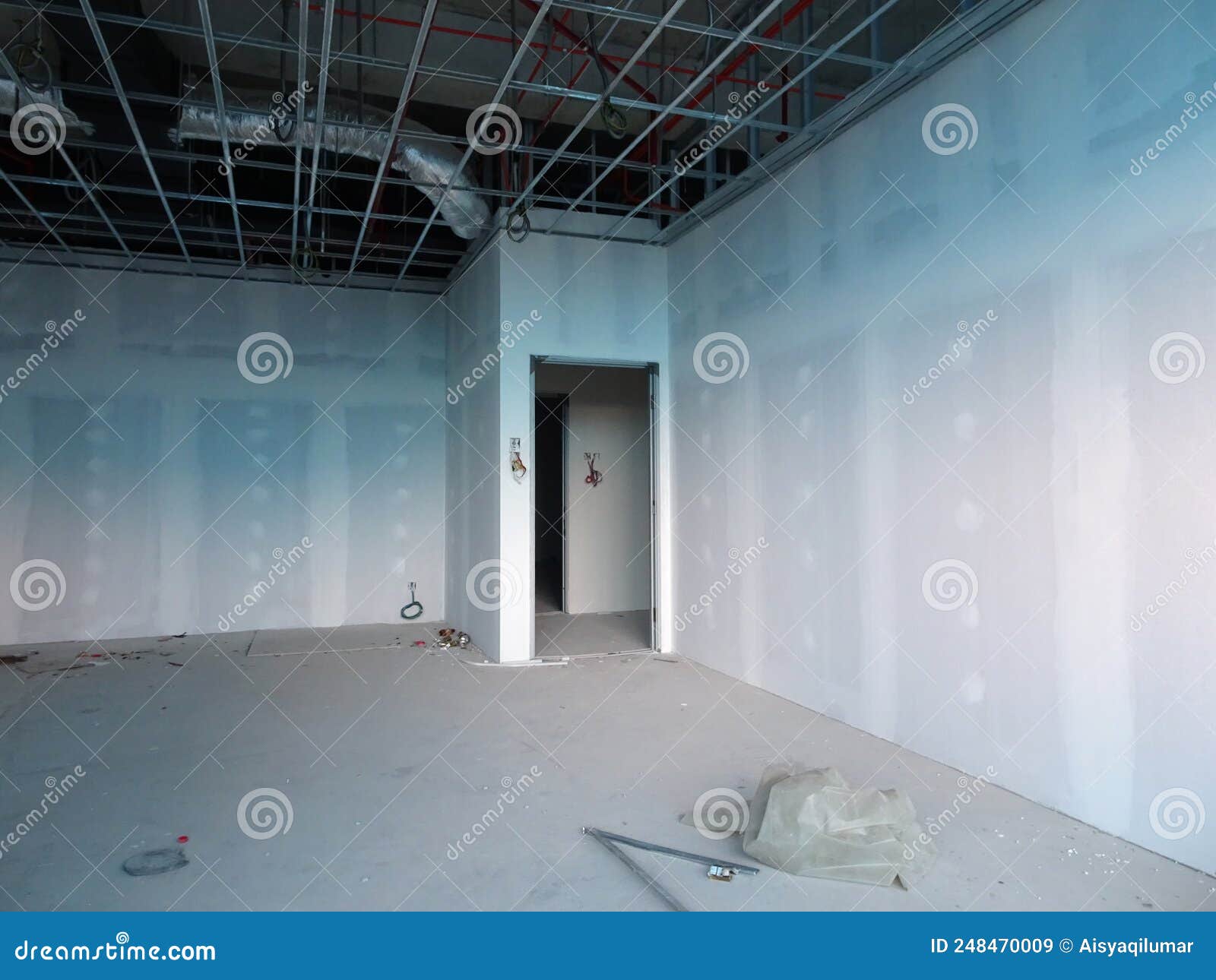 Drywall Installation Work in Progress by Construction Workers at the