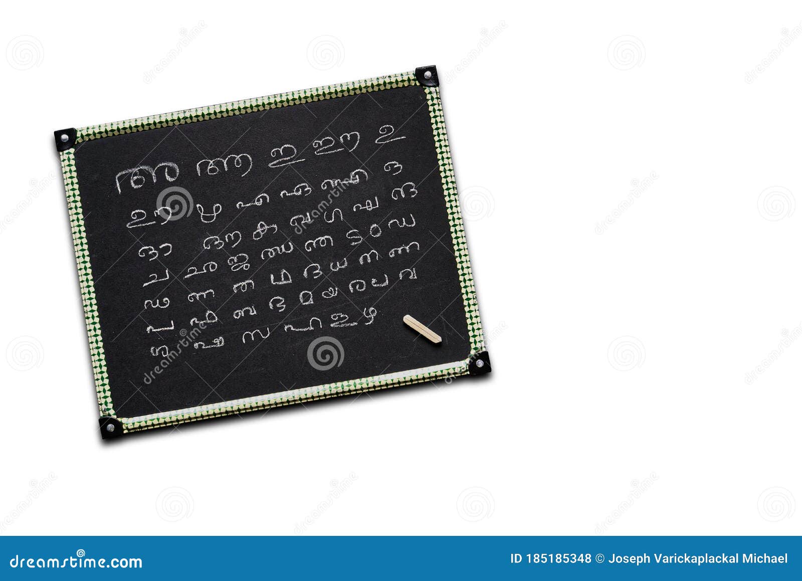 Malayalam Alphabets Written on a Kid`s Slate Board Stock