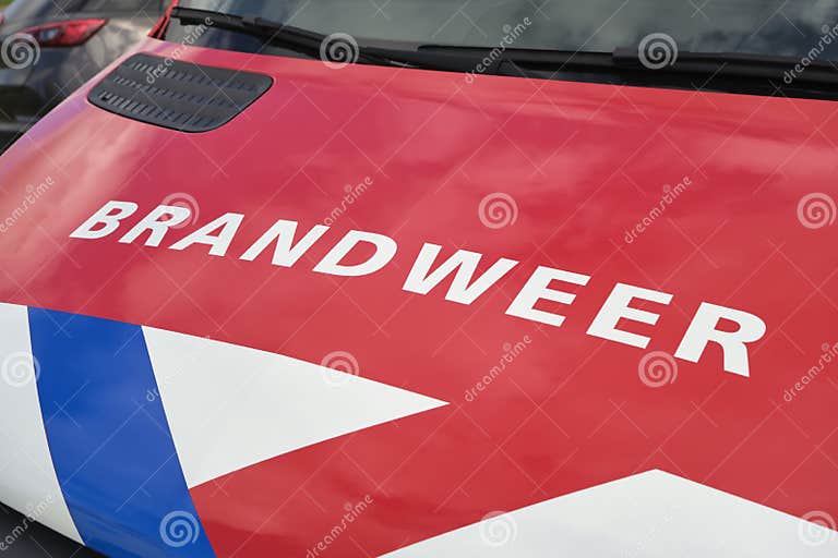 Dutch Fire Department Logo on the Hood of a Car Editorial Stock Image