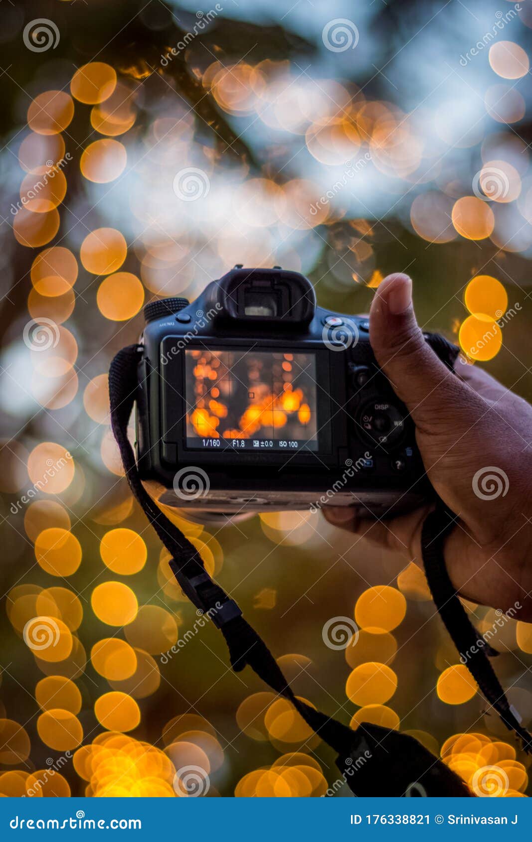 DSLR Camera on Bokeh Background - Black DSLR Camera with Bokeh Lights Photo  and Camera City Lights Bokeh Photos Stock Image - Image of direct, city:  176338821