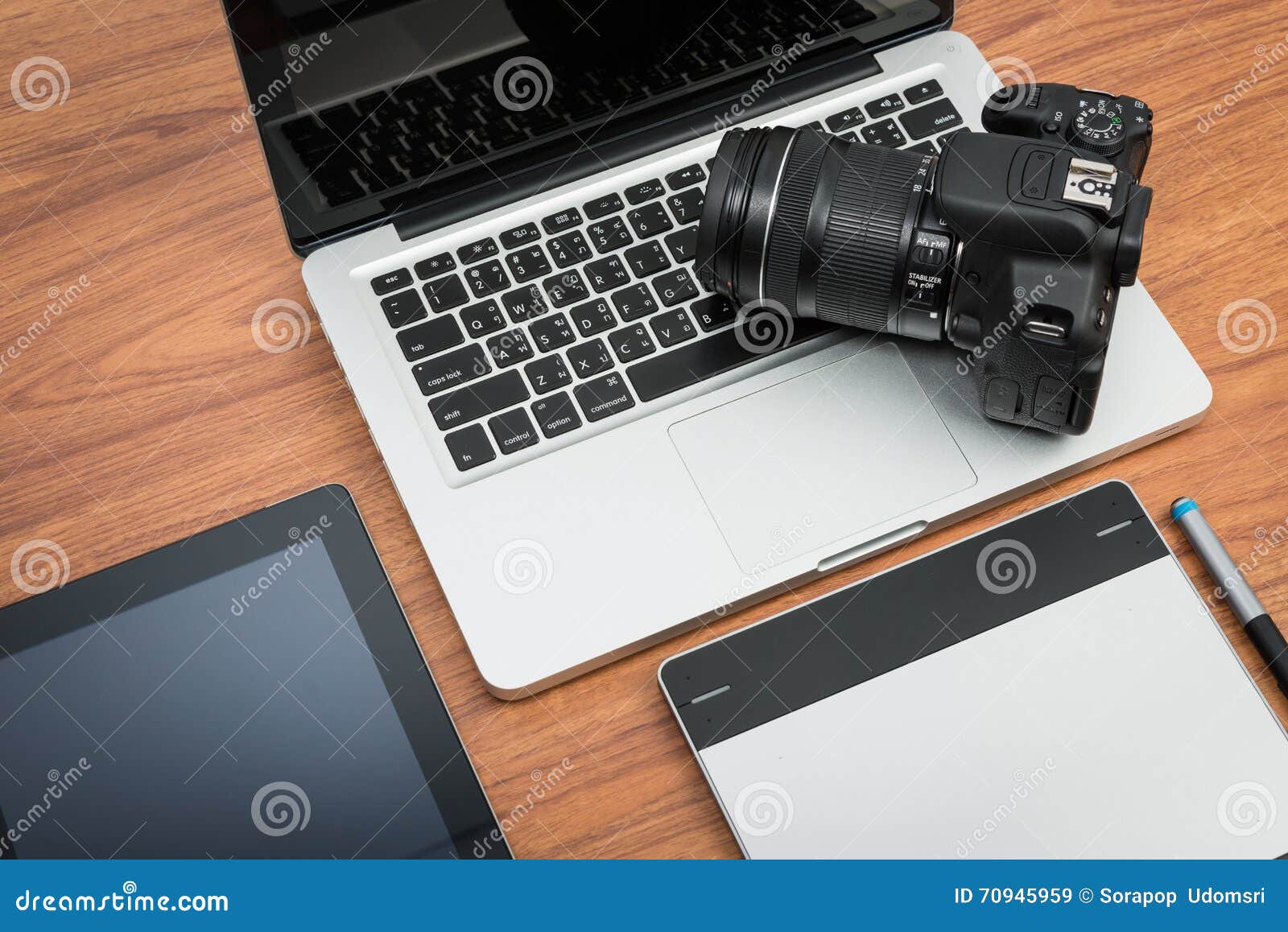 DSLR Digital Camera With Tablet And Notebook Laptop Stock ...