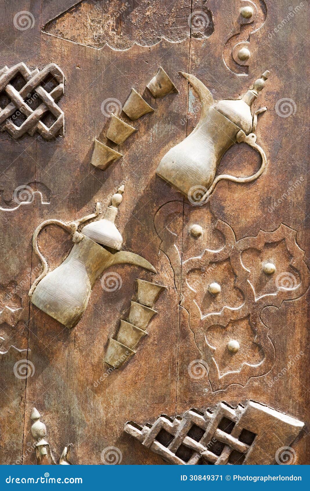 dubai uae ornately decorated wood doors at heritage village in bur dubai