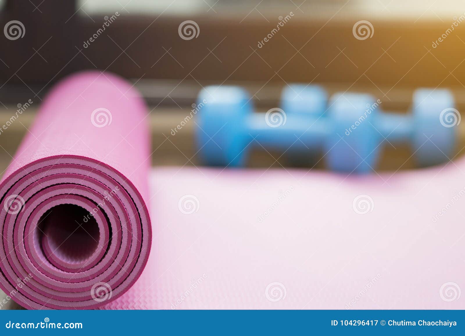 Dumbbell and Yoga Mat on Table Stock Image - Image of workout, exercise ...