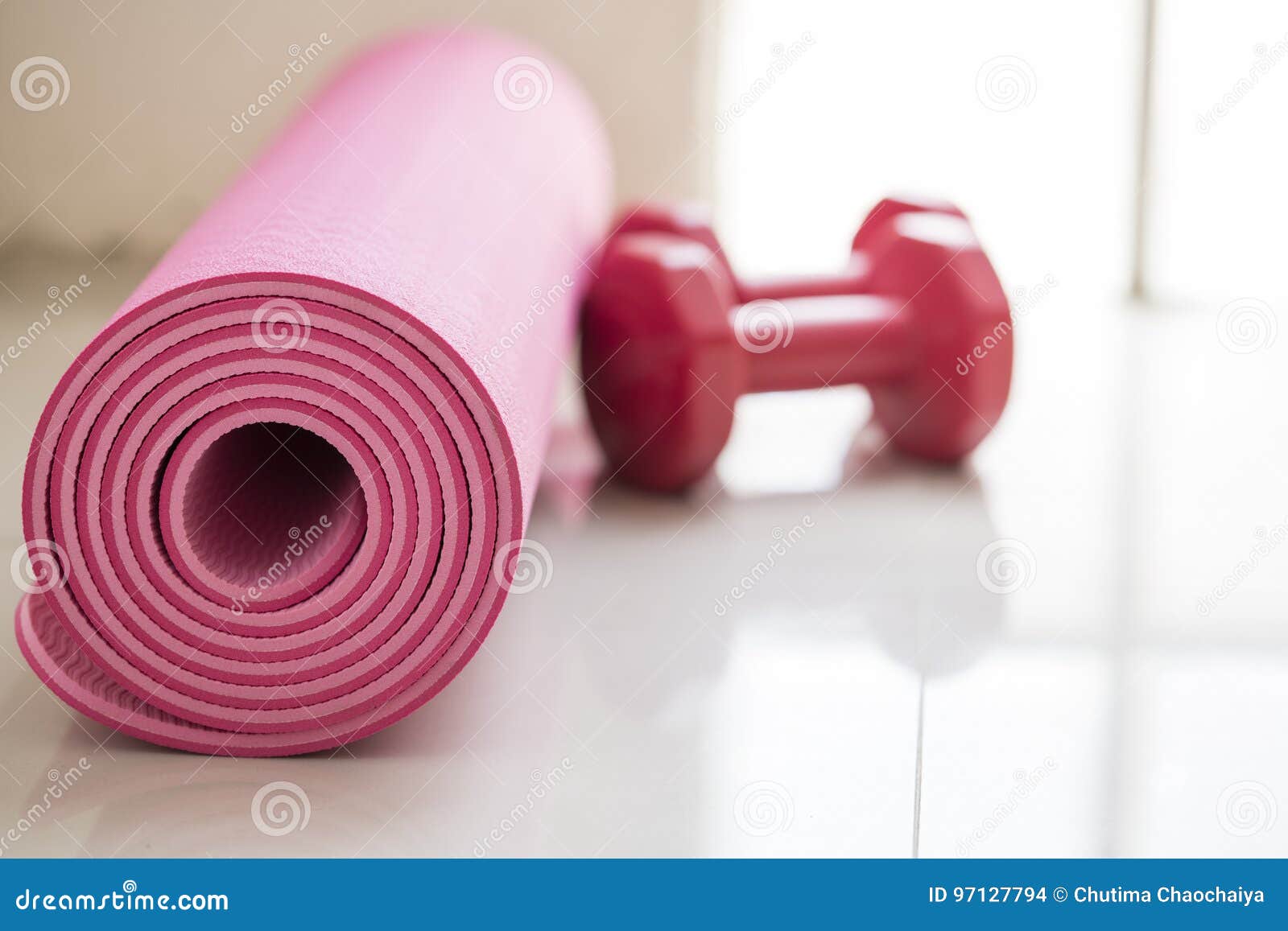 Dumbbell and Yoga Mat on Table Stock Photo - Image of pink, healthy ...