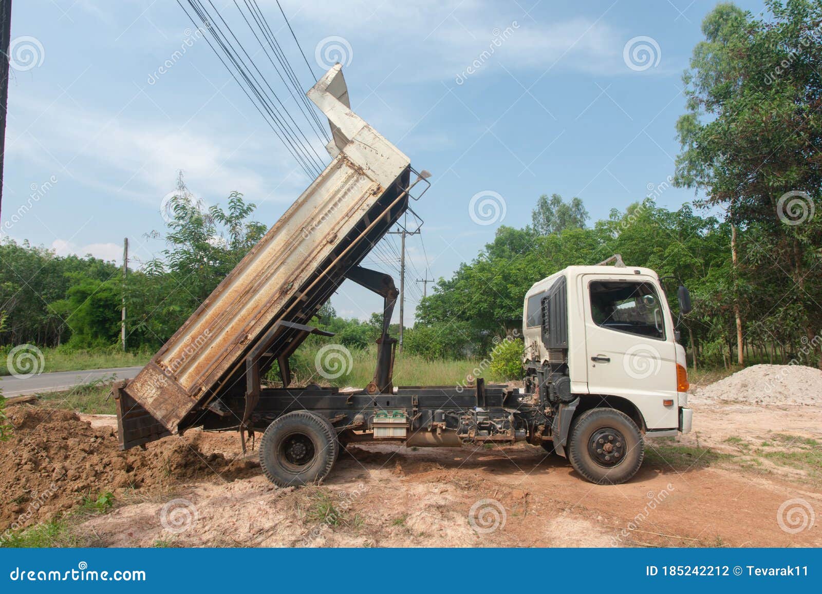 Dump Truck Unloading Soil at Construction Site Stock Photo Image of
