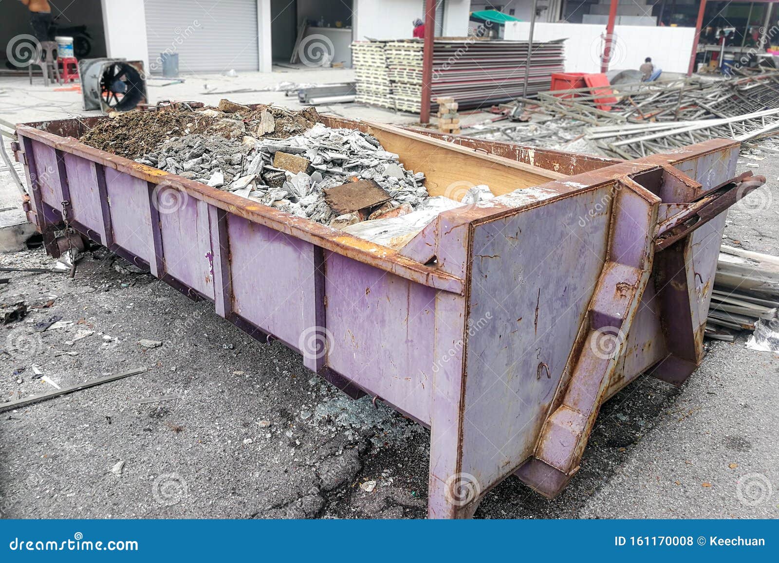 dumpster-full-load-construction-site-background-rennovation-161170008.jpg