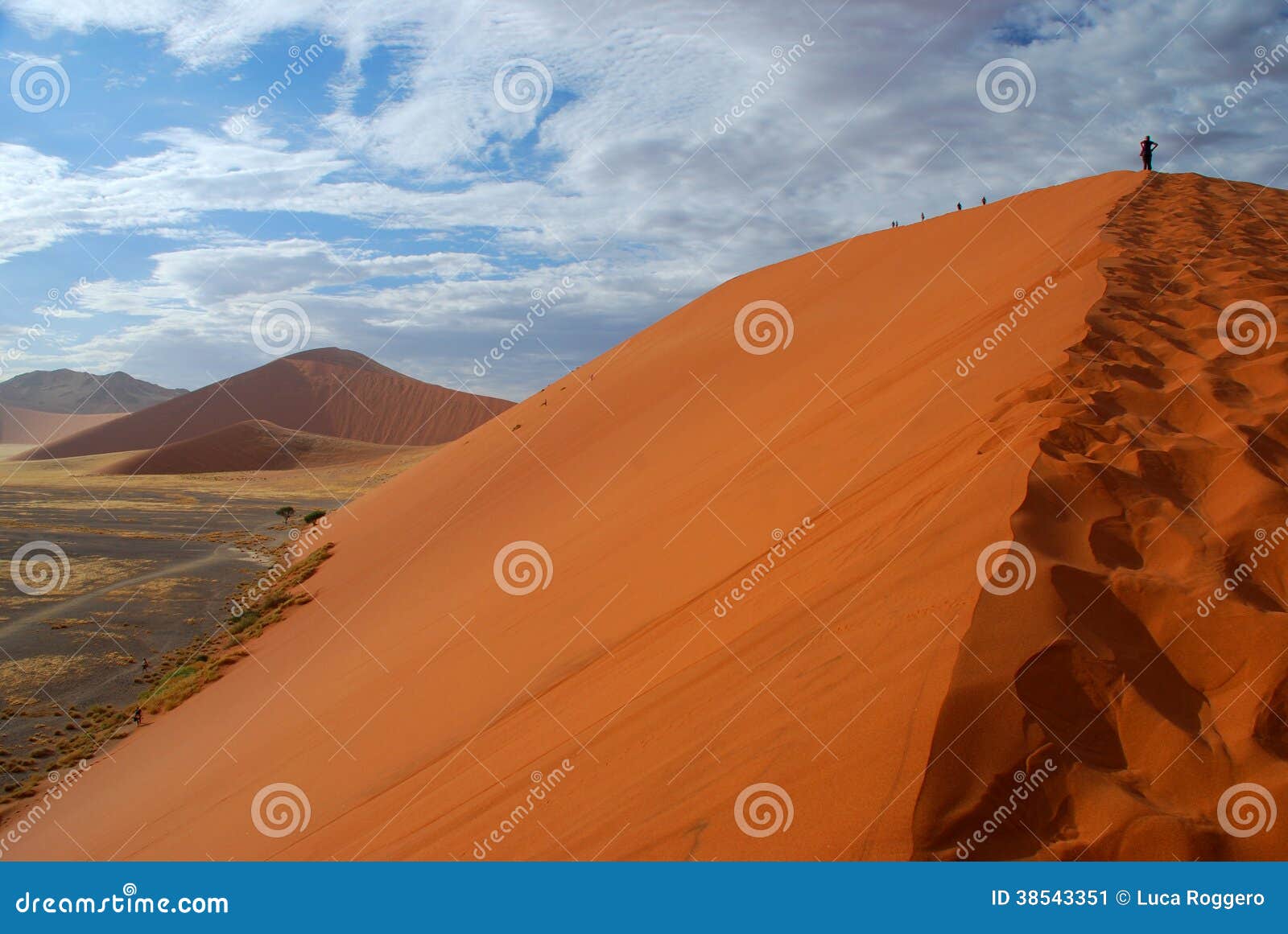 dune 45 climbing. sossusvlei, namibia