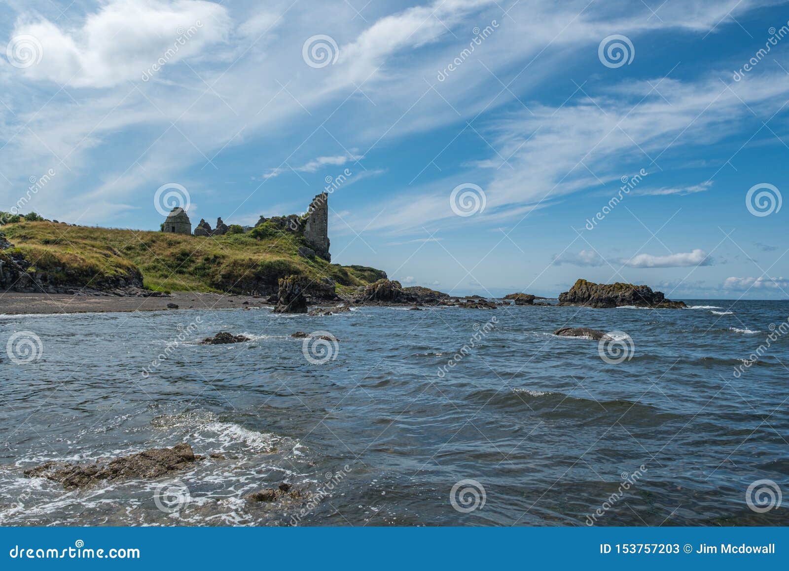 dunure  castle ruins and rugged coast line in scotland outlander filming location with its rugged sea defences