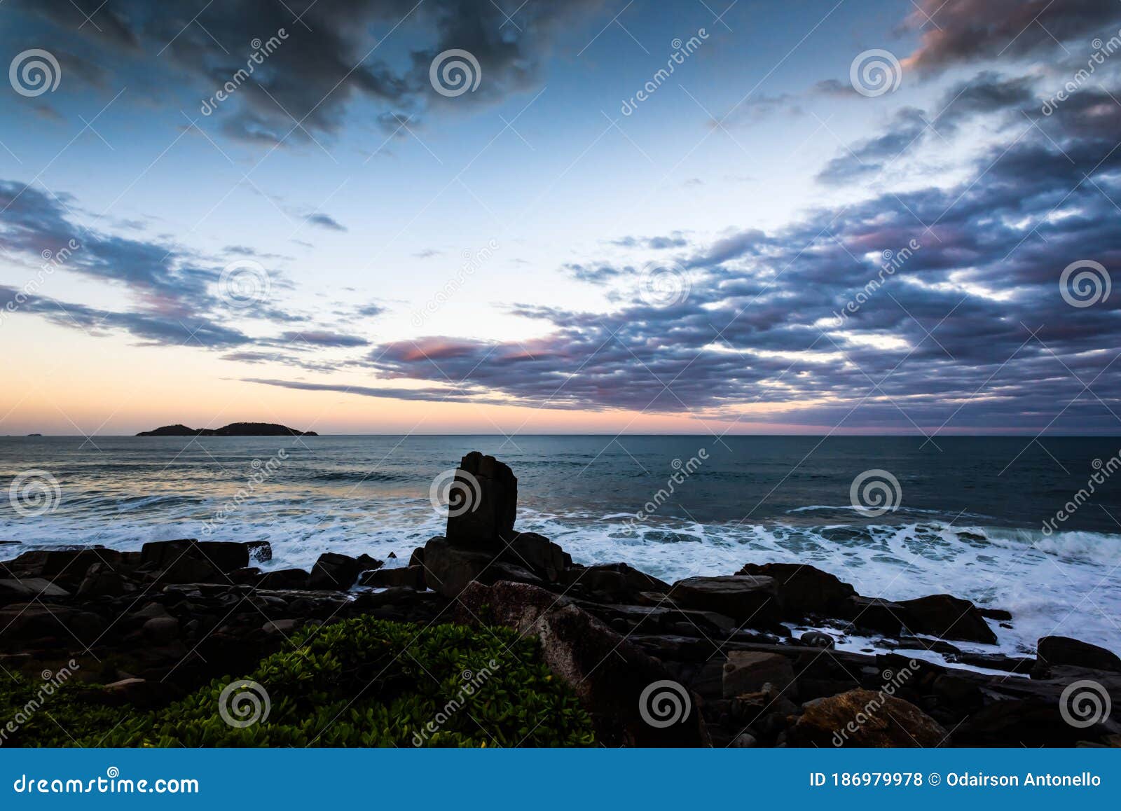 dusk florianopolis beach, morro das pedras in portuguese, with space for writing