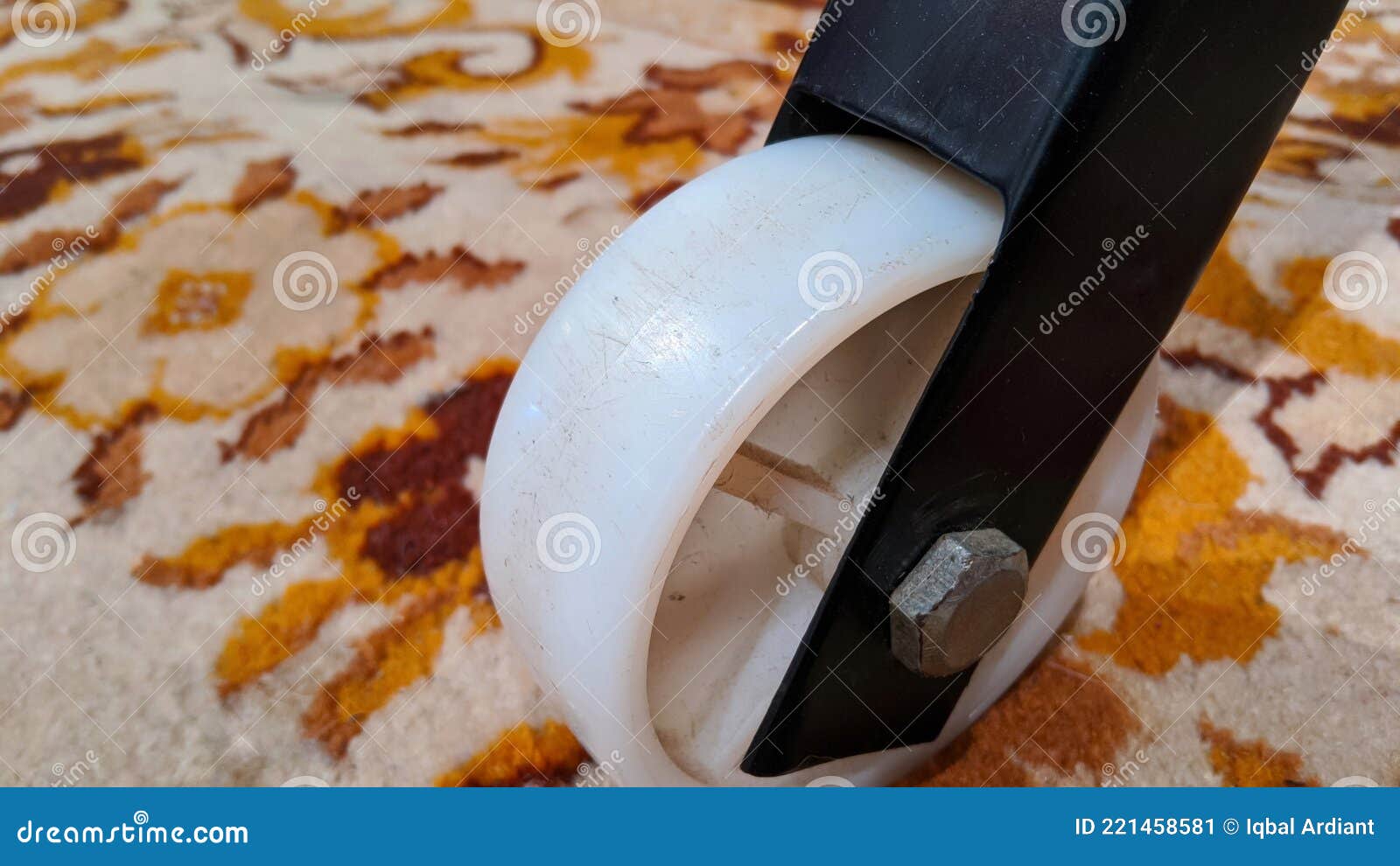 Dusty White Plastic Wheels on a Brown Carpet. Stock Image Image of floor, bolt 221458581
