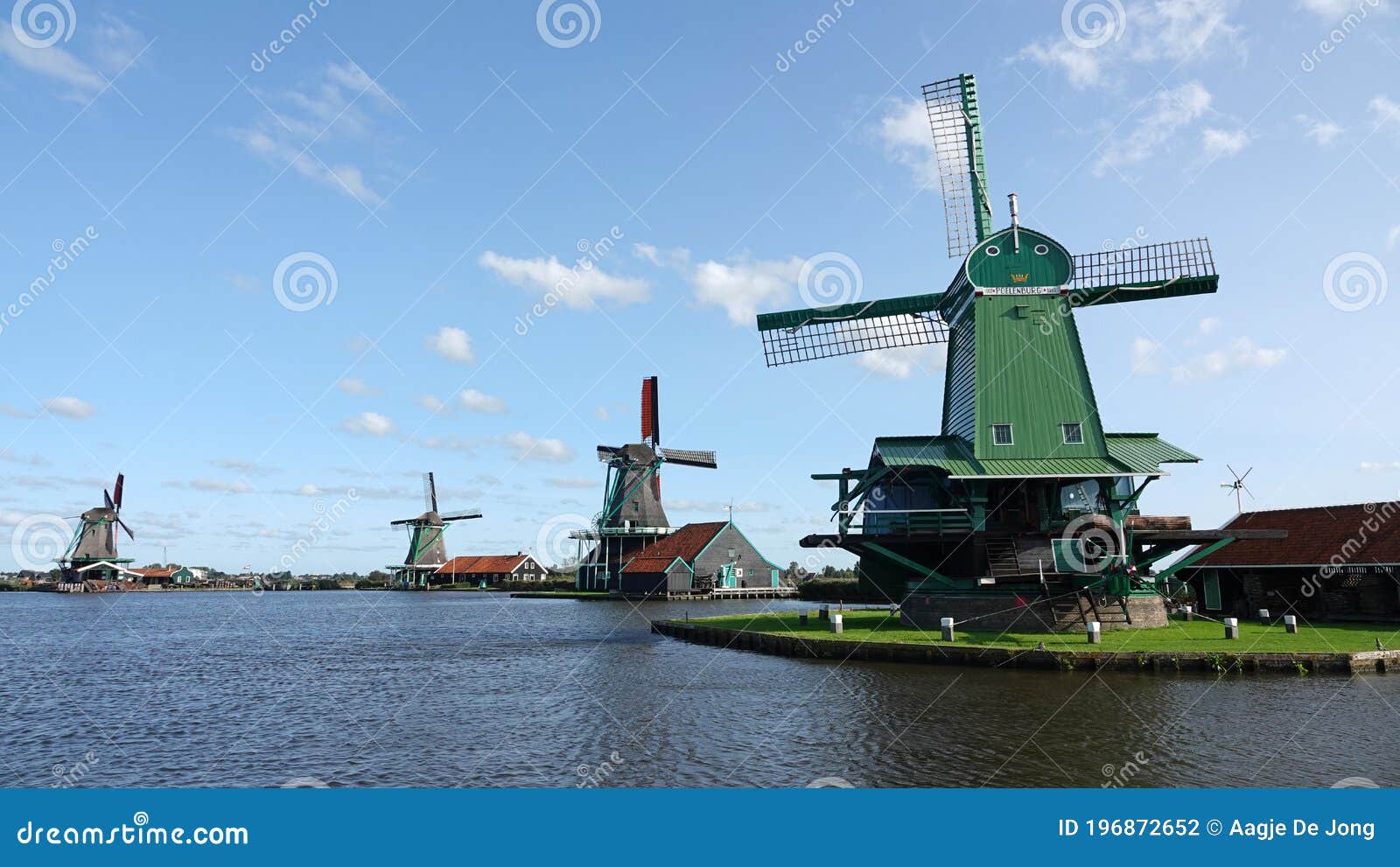 dutch windmills on the zaan river at the zaanse schans in zaandam, the netherlands