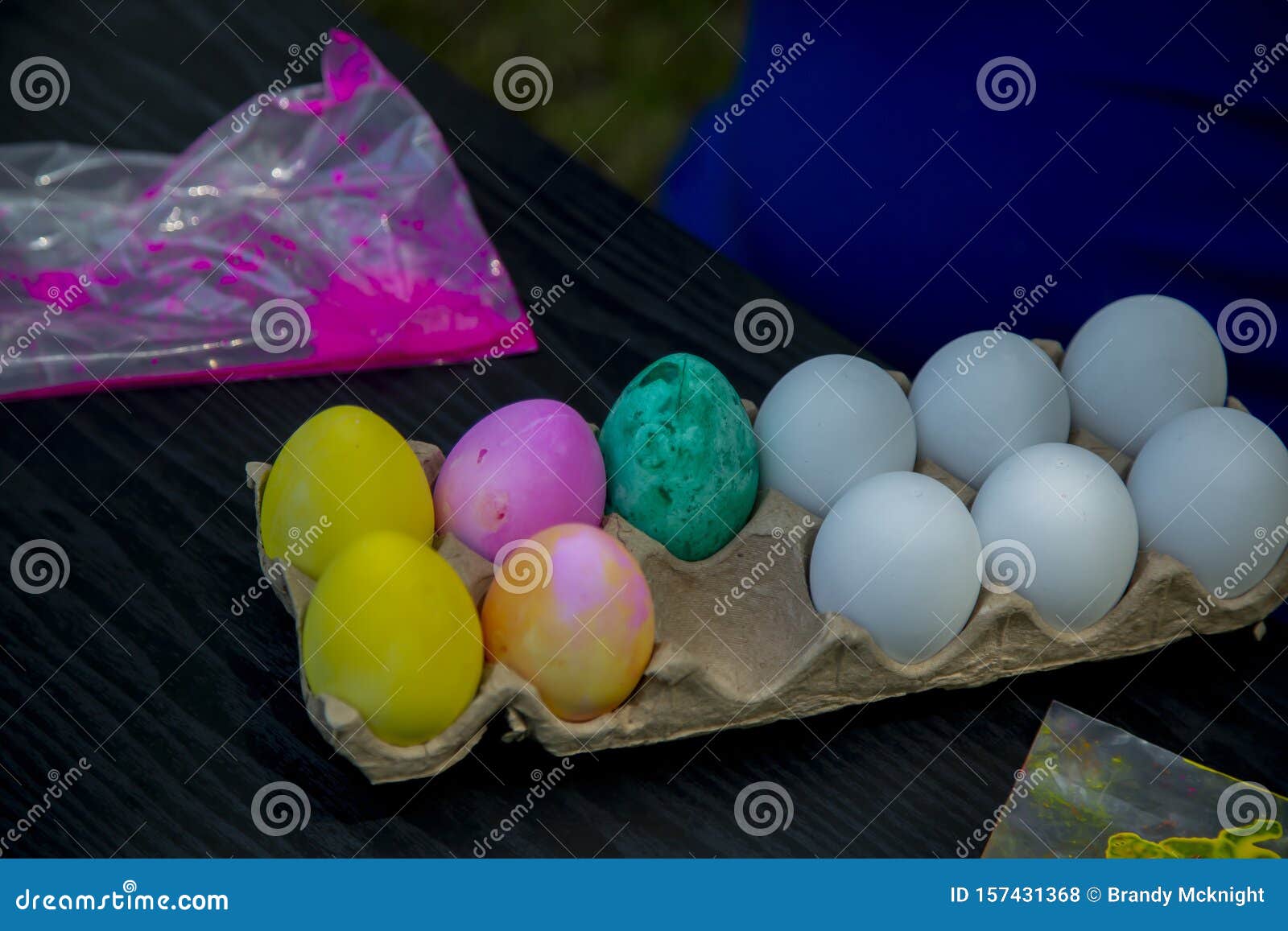 Dying Easter Eggs stock photo. Image of beautiful, dyed 157431368