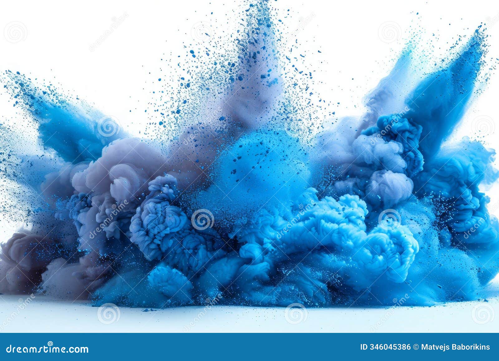dynamic blue powder explosion on white background showcasing vivid movement and color contrast