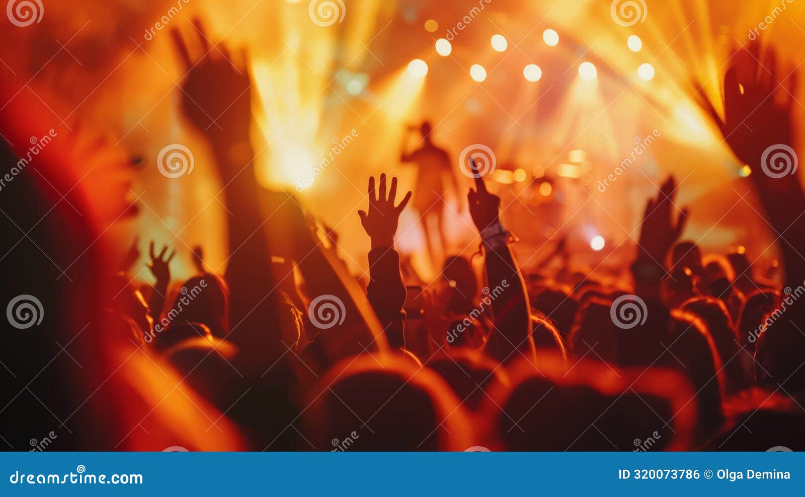 dynamic festival crowd with hands raised under bright stage lights. captures the vibrant atmosphere and energy of live