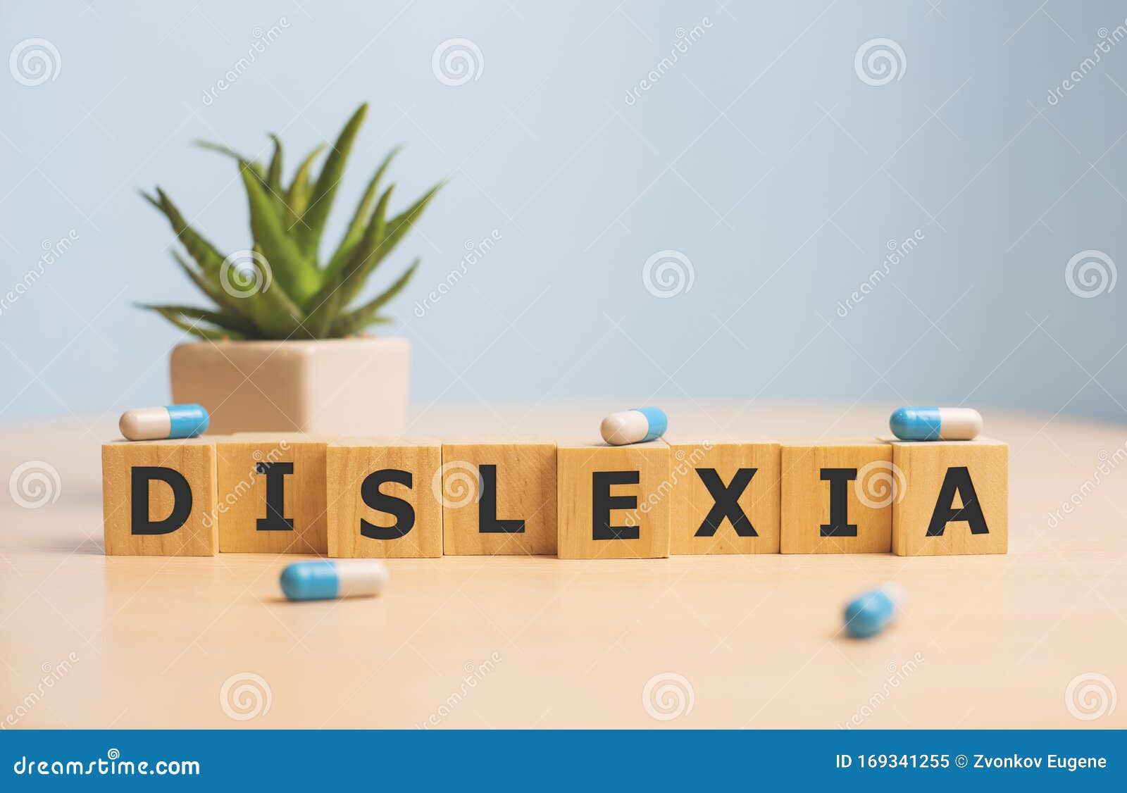 dyslexia word written in wooden cube, dislexia concept.