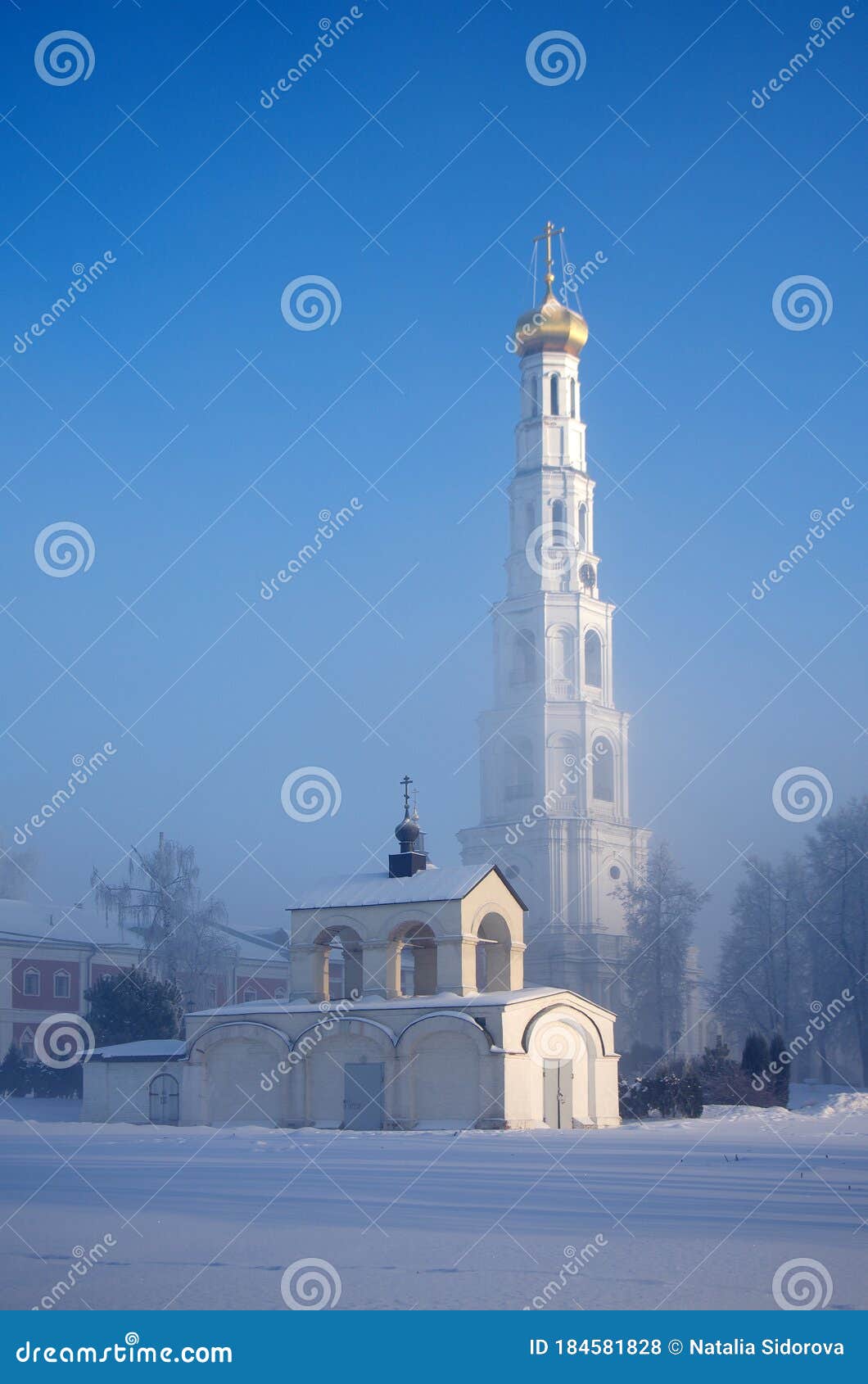 dzerzhinsky, russia - december, 2016: ugresha monastery in a foggy winter day, the belltower