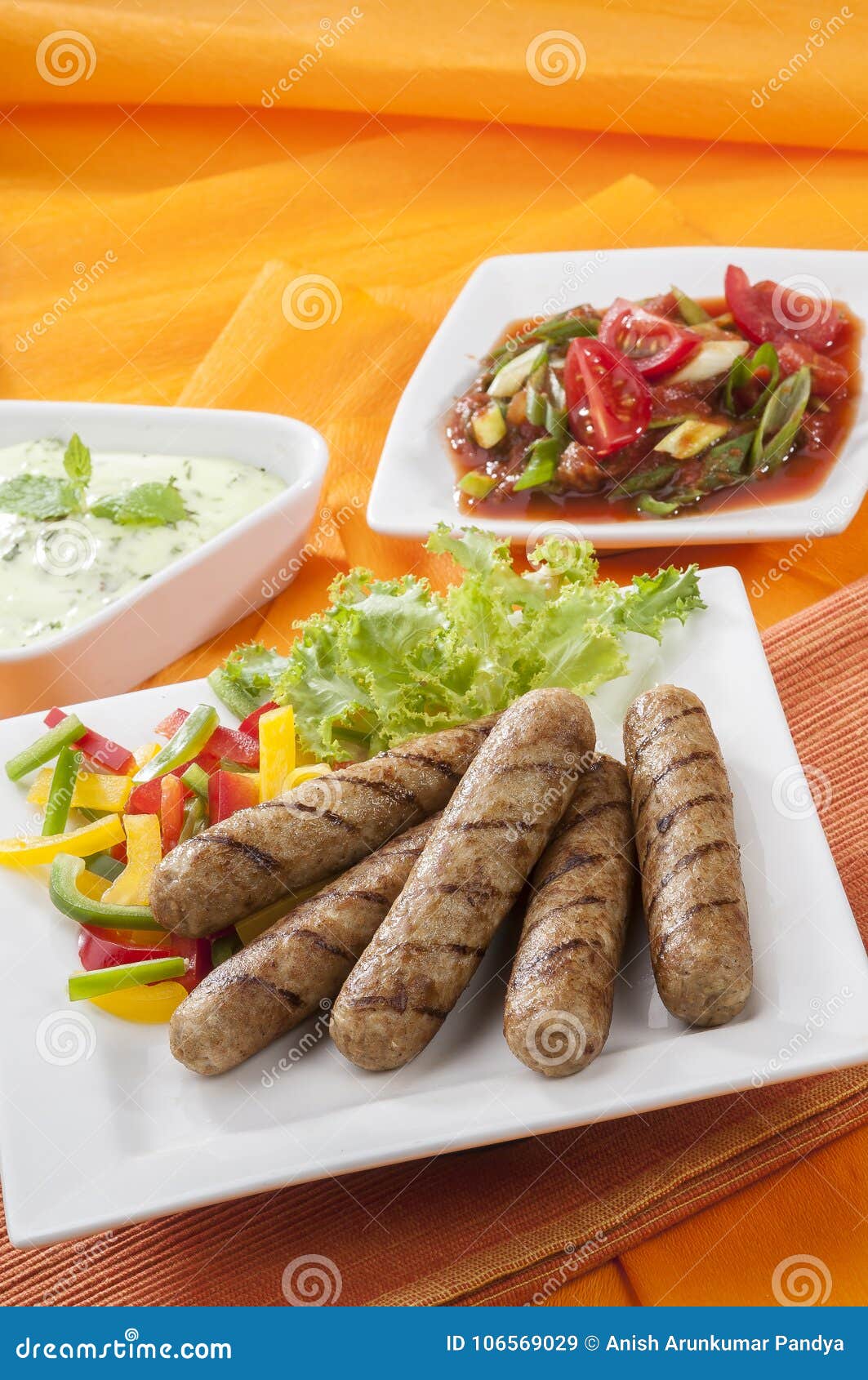 Chicken Seekh Kebabs with Letus Coloured Bell Pepper with Tomato Onion