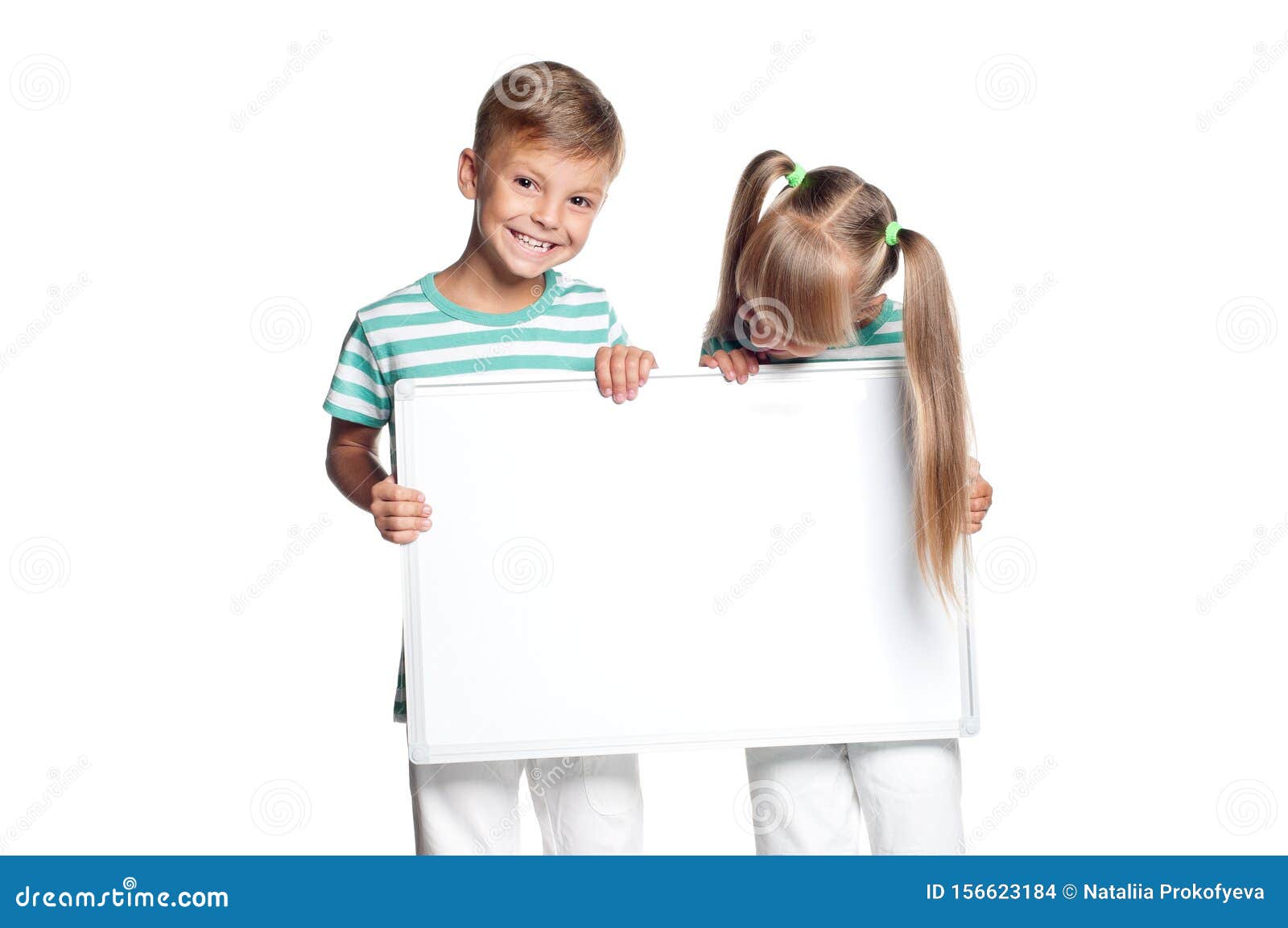 Little boy and girl holding board. R r