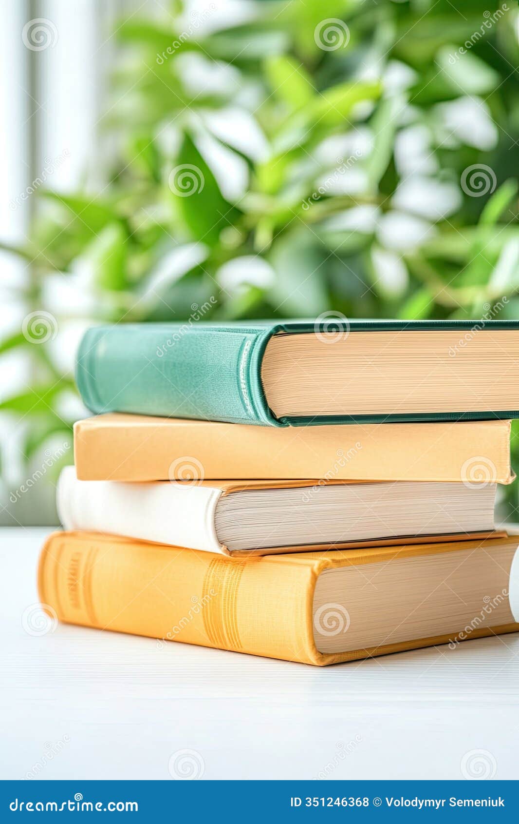 explore a vibrant collection of book covers displayed on a modern e-reader surrounded by nature