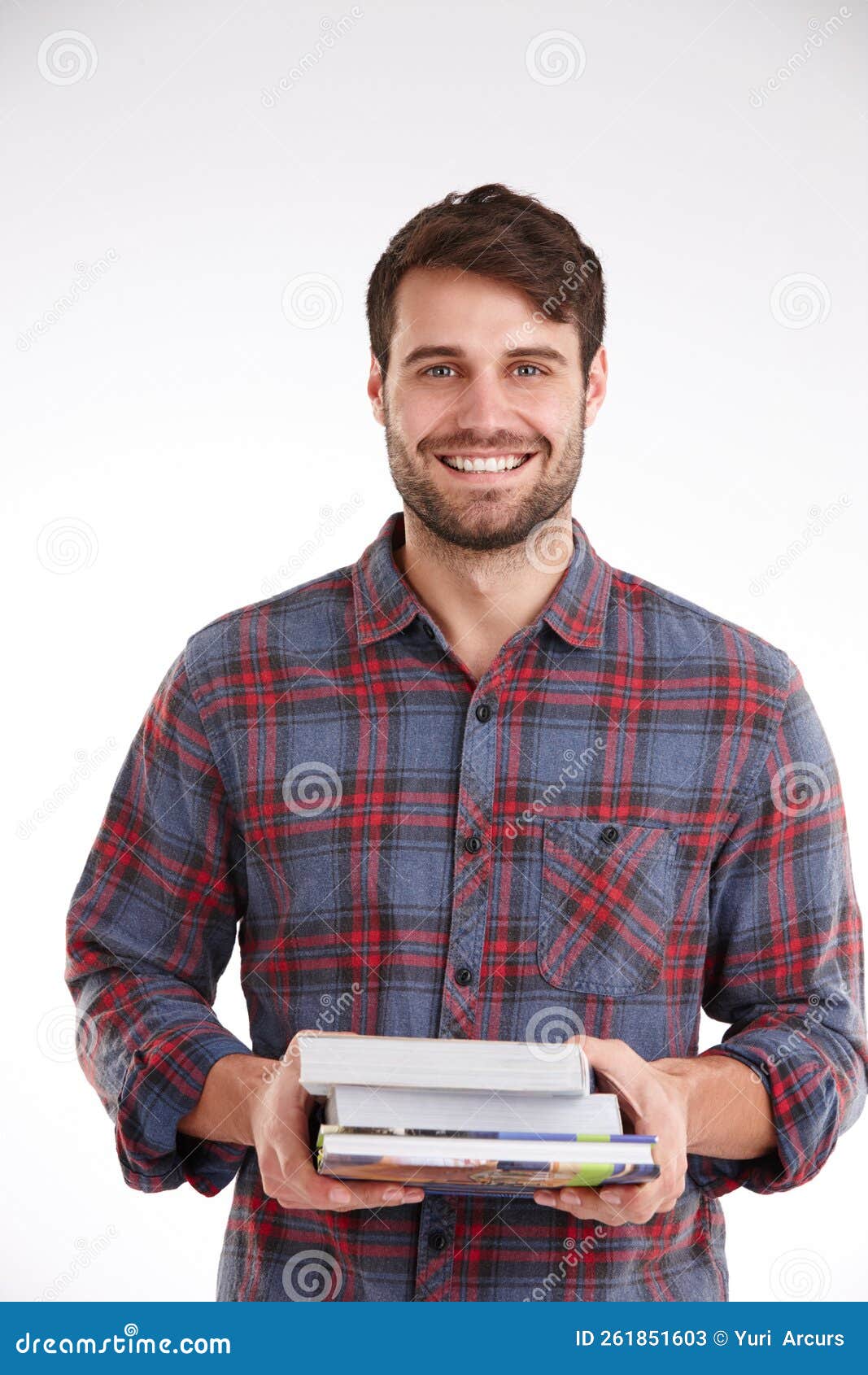 Always eager to learn studio portrait of a smiling young man holding a