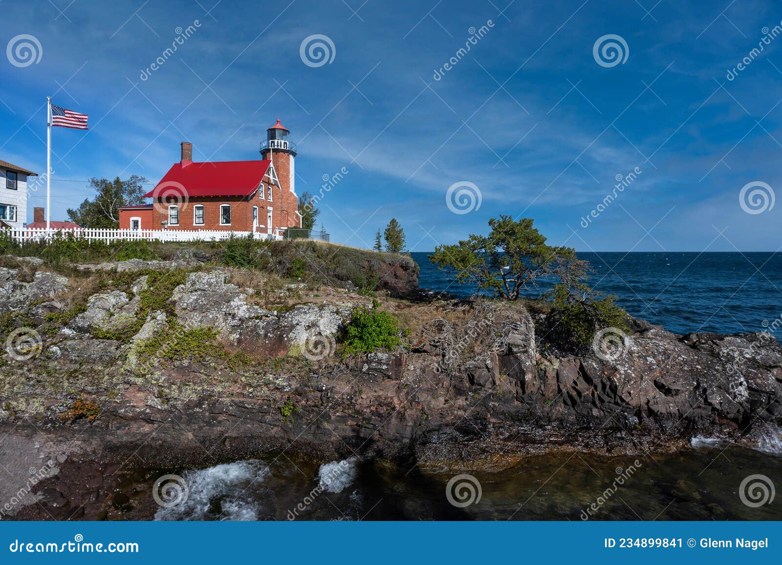Eagle Harbor Lighthouse on Edge of Cliff Editorial Photo Image of outdoors, daytime 234899841