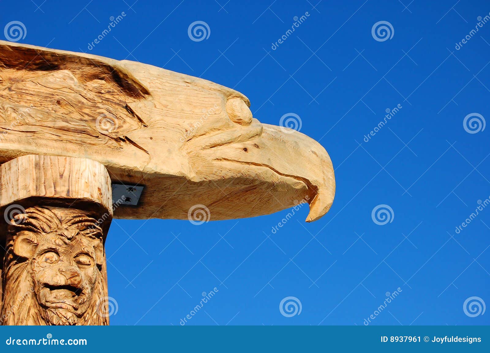 Eagle And Lion Wood Carving Totem Pole Stock Image - Image 