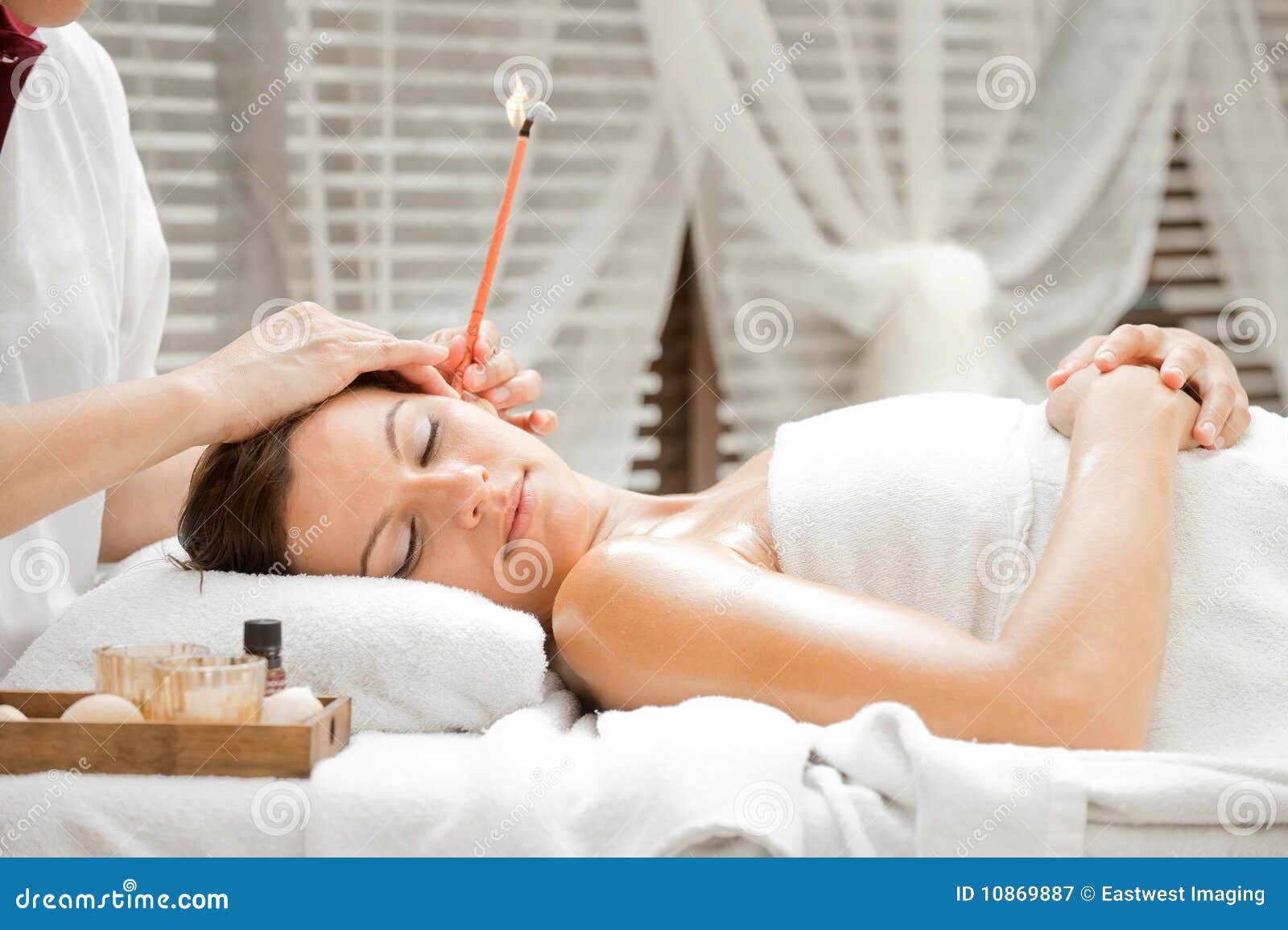 Ear Candling in Spa stock image. Image of looking, peaceful 10869887