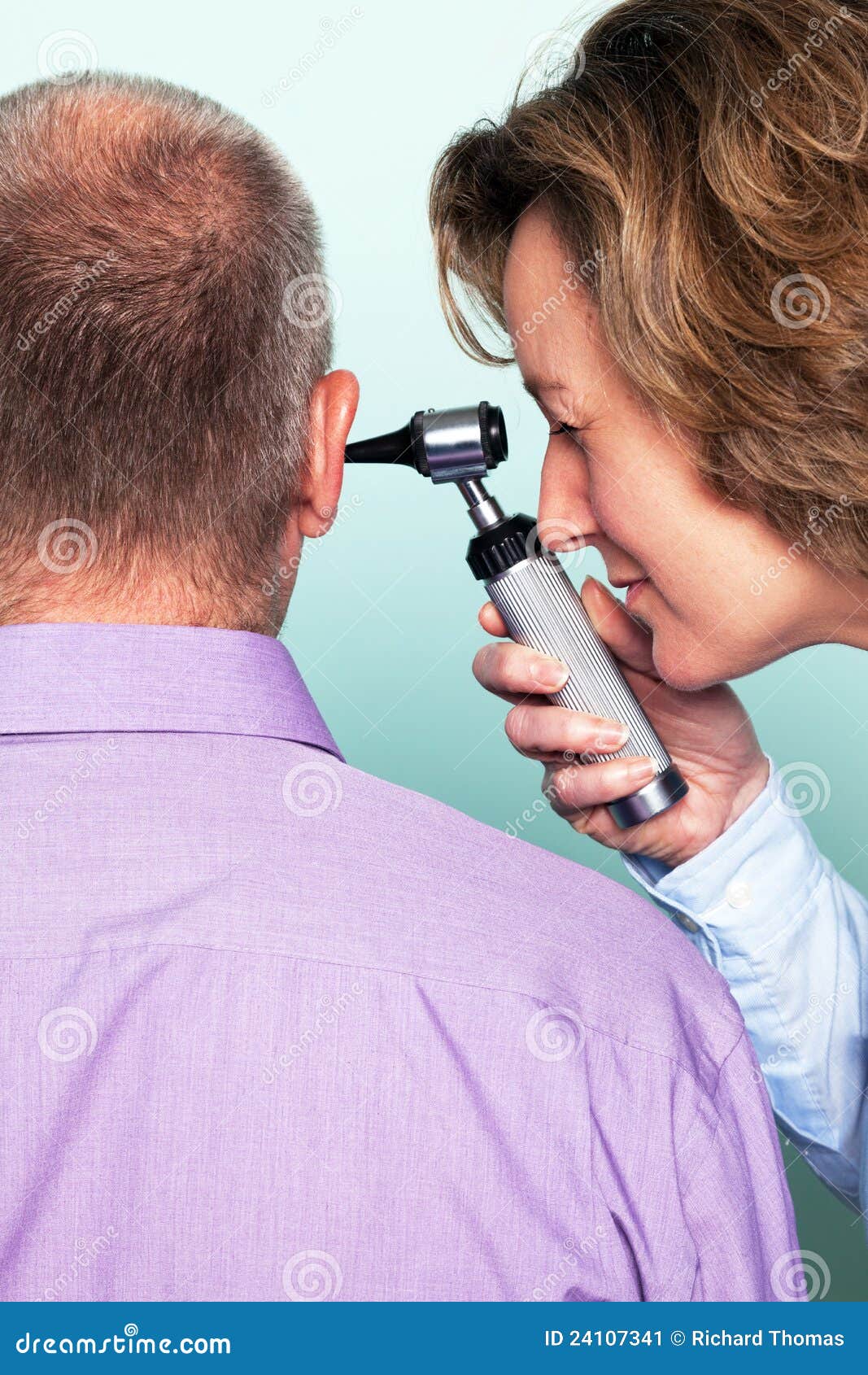 Ear examination stock image. Image of exam, examining 24107341