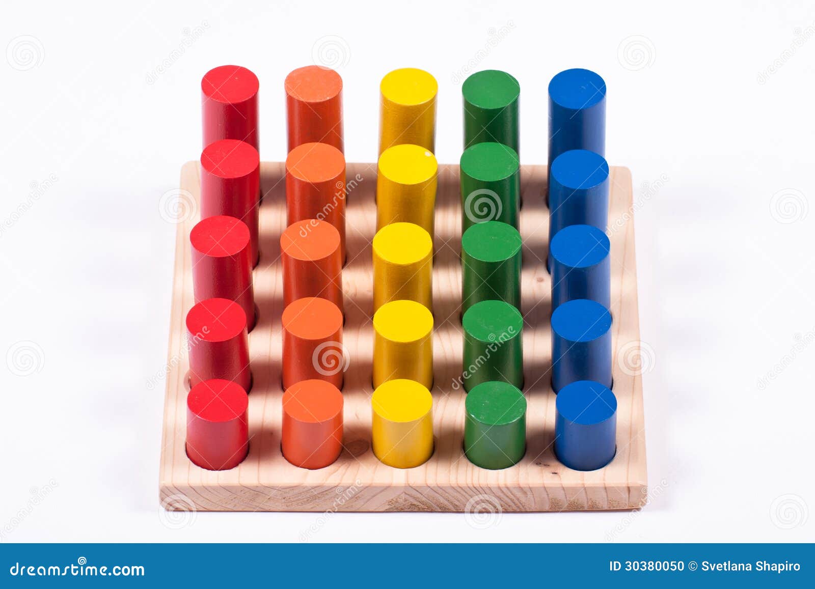 early learning toy: cylinders of different colors and height