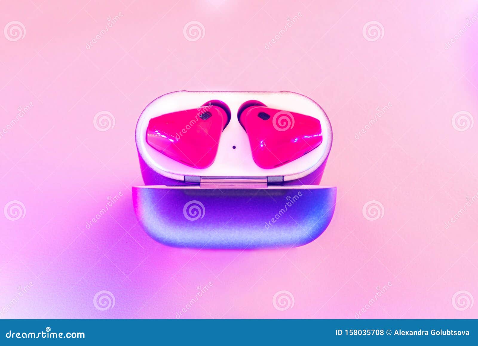Earphones in the box. stock photo. Image of neon, digital 158035708
