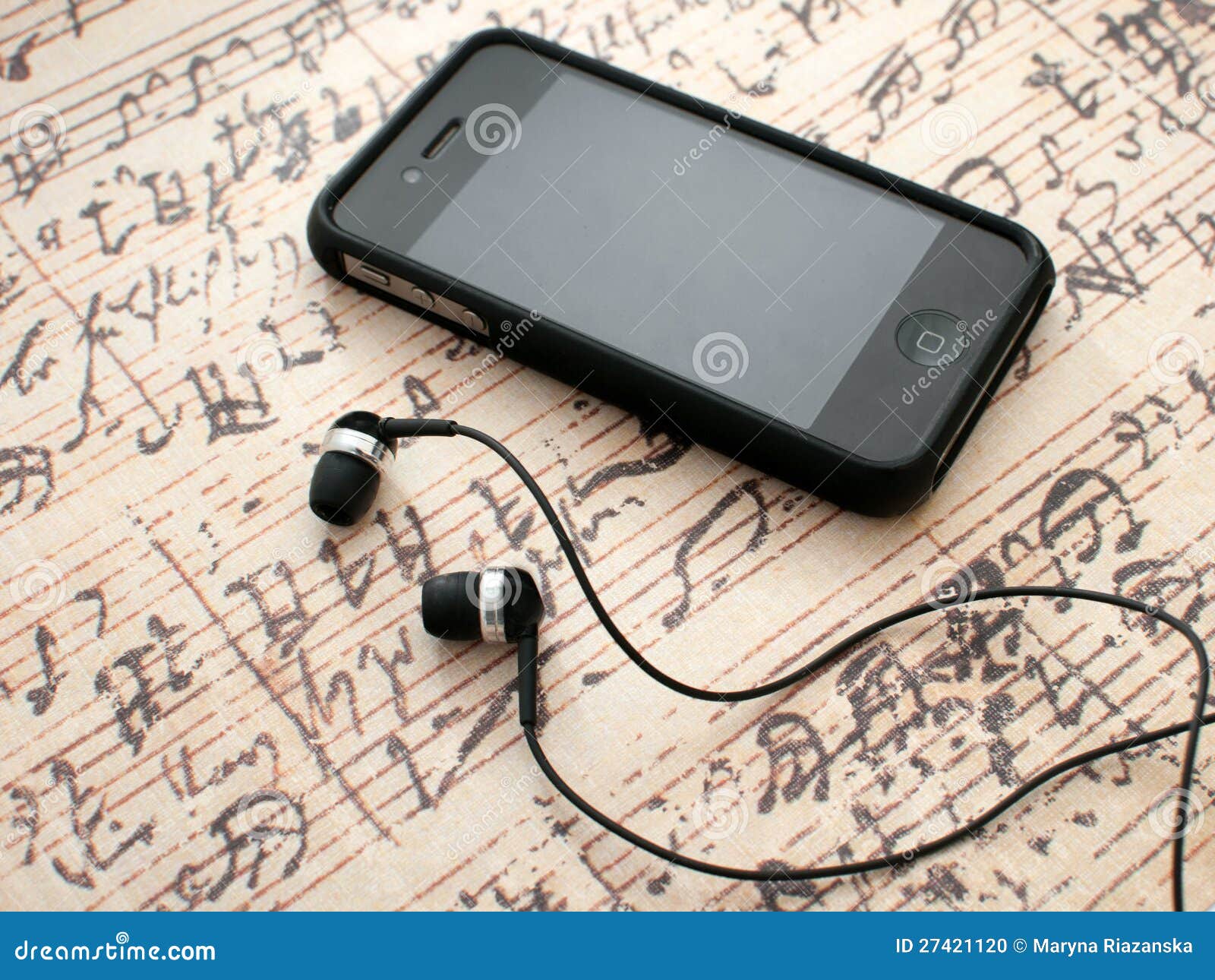 Earphones and Phone on Music Sheet Background Stock Photo Image of