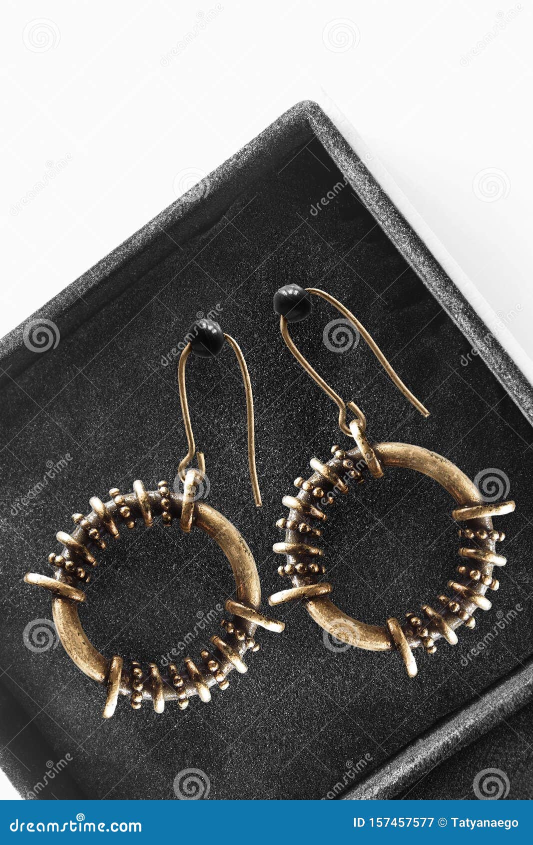 Earrings in a box stock image. Image of gold, chic, bronze 157457577
