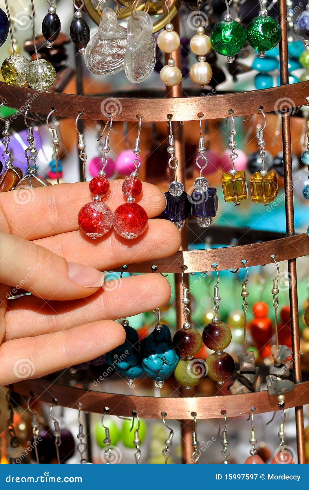 Earrings on a market stall stock image. Image of inexpensive 15997597