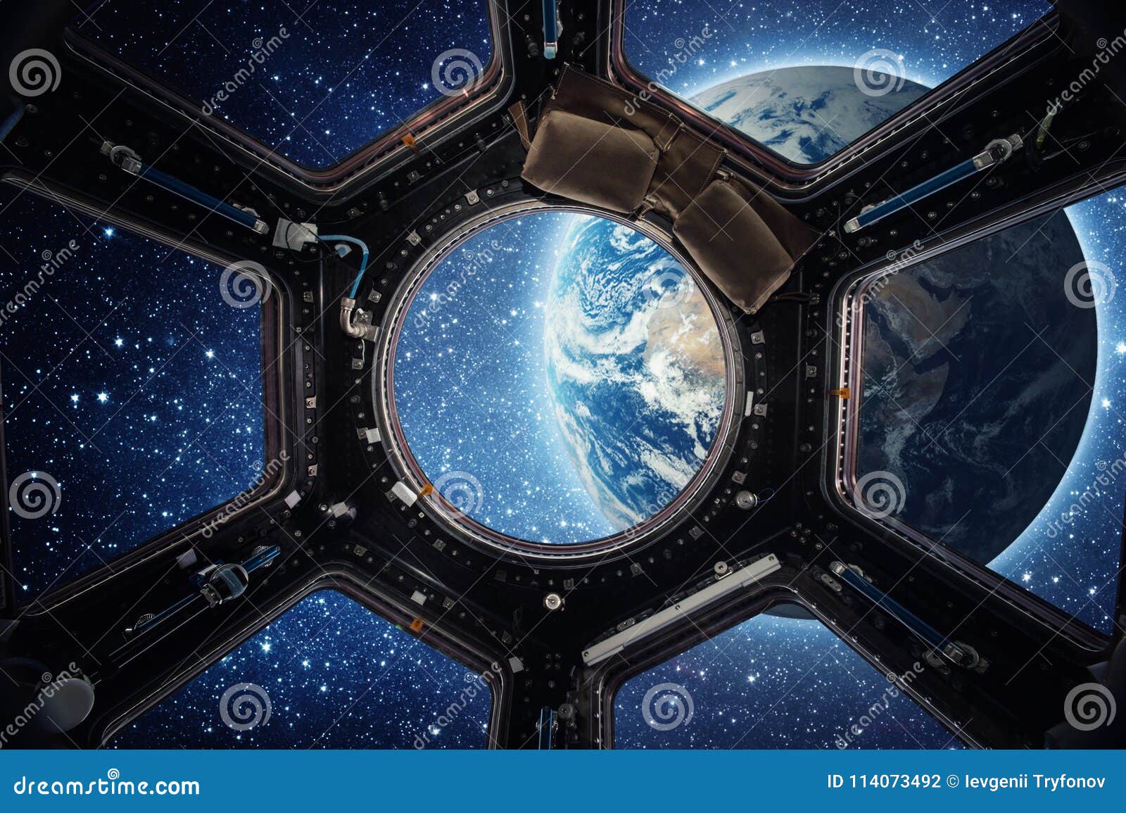 earth and galaxy in spaceship international space station window