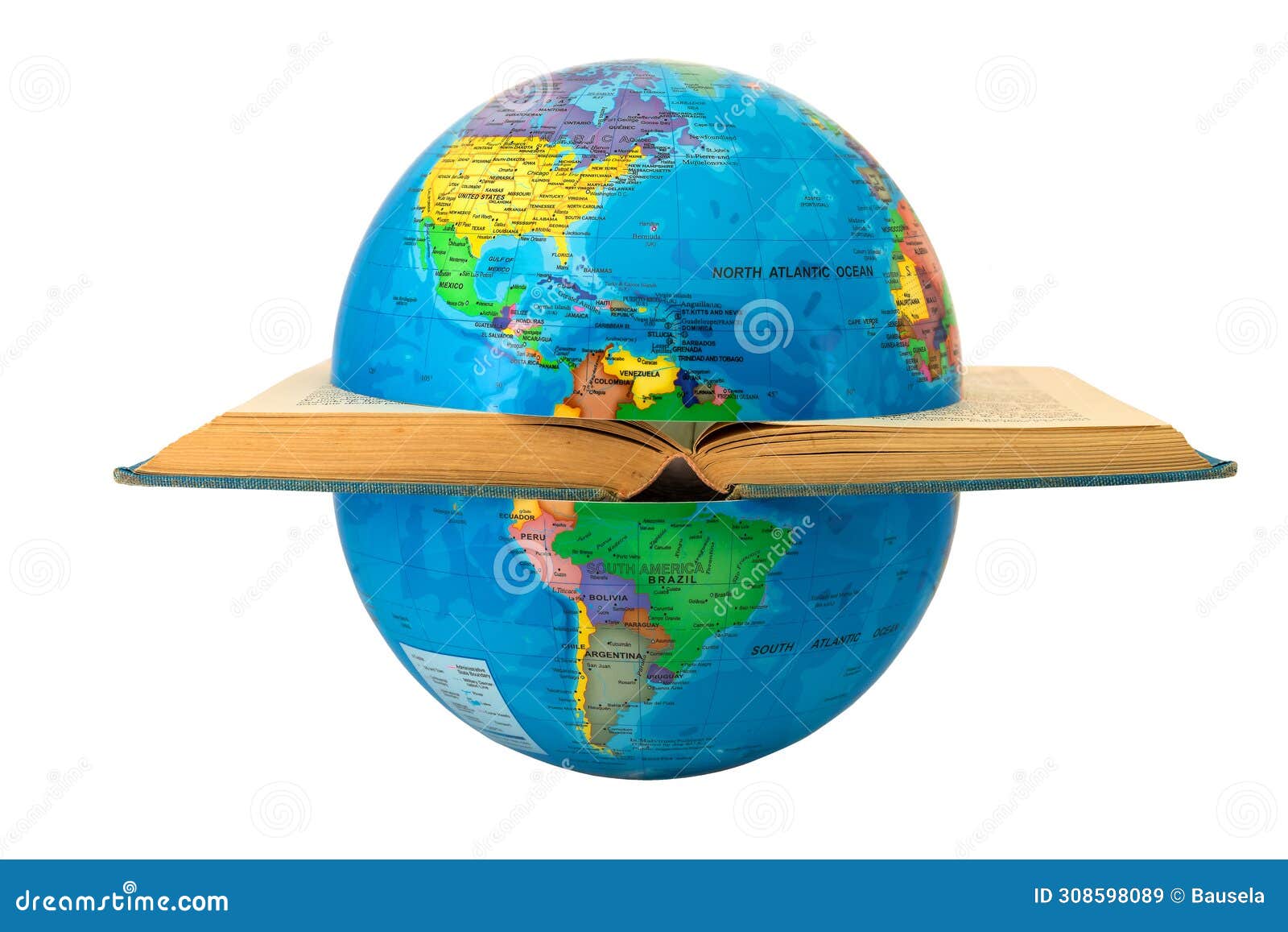 earth globe divided by a book showing america: concept of division and war. the open book izes the cultures that divide the