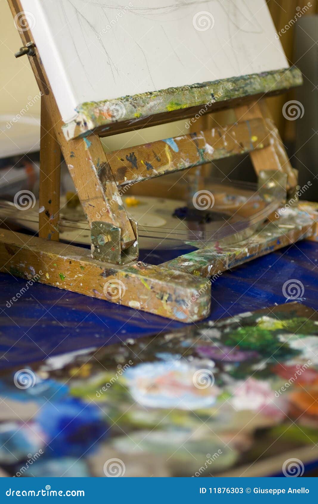 Easel and palette stock image. Image of school, colored 11876303