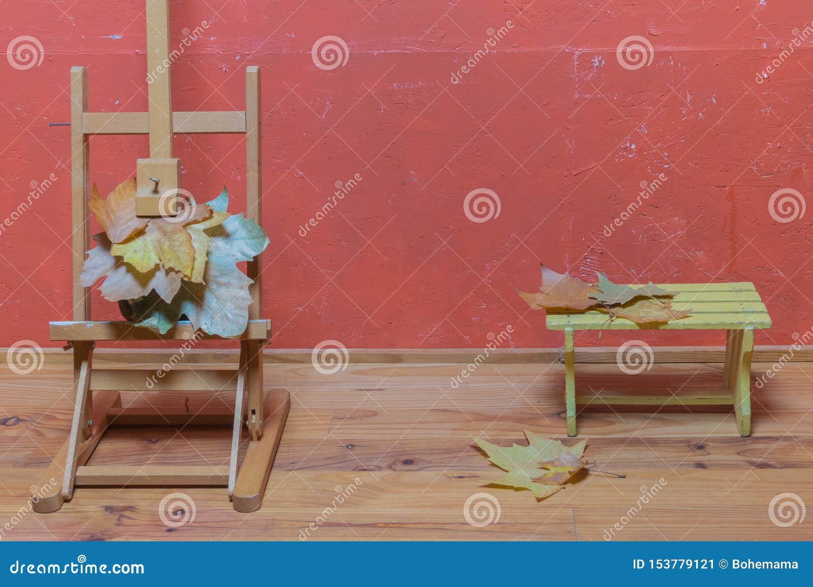 Easel Stand With Dried Leaves Small Bench And Dried Leaves On