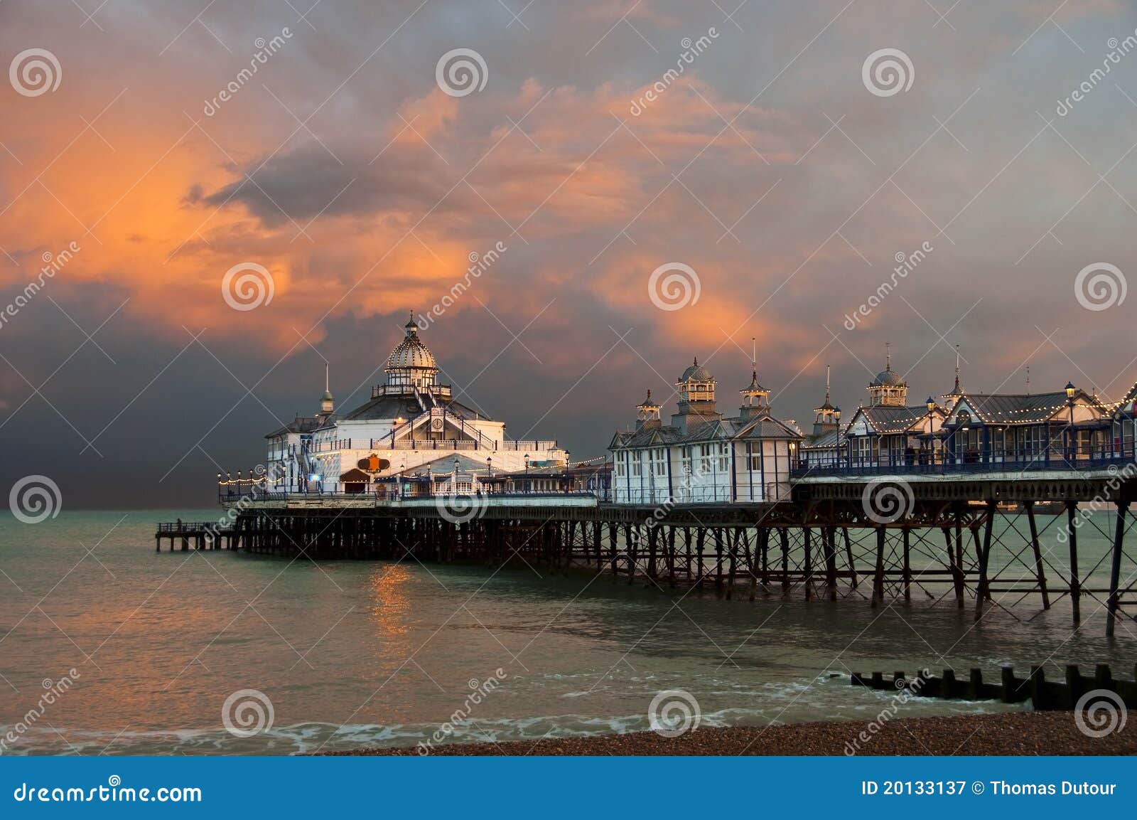 Eastbourne pier at sunset stock image. Image of vintage 20133137