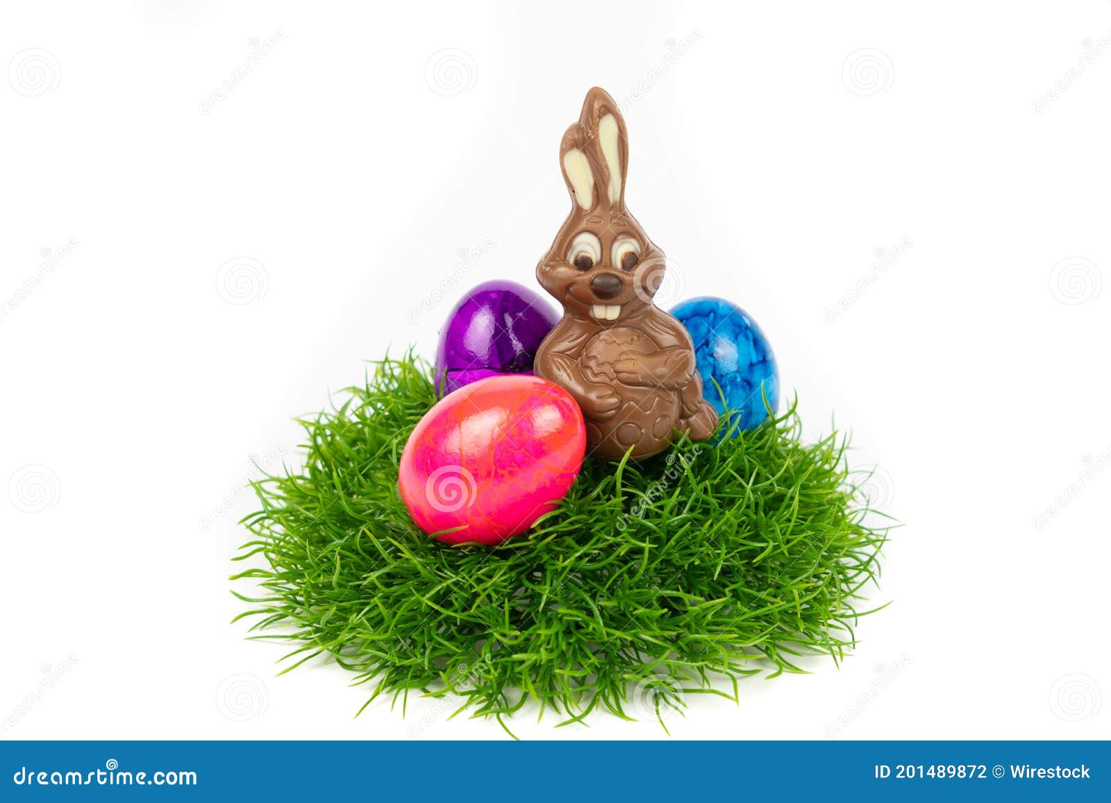 Easter Basket with Chocolate Easter Bunny and Colorful Easter Eggs