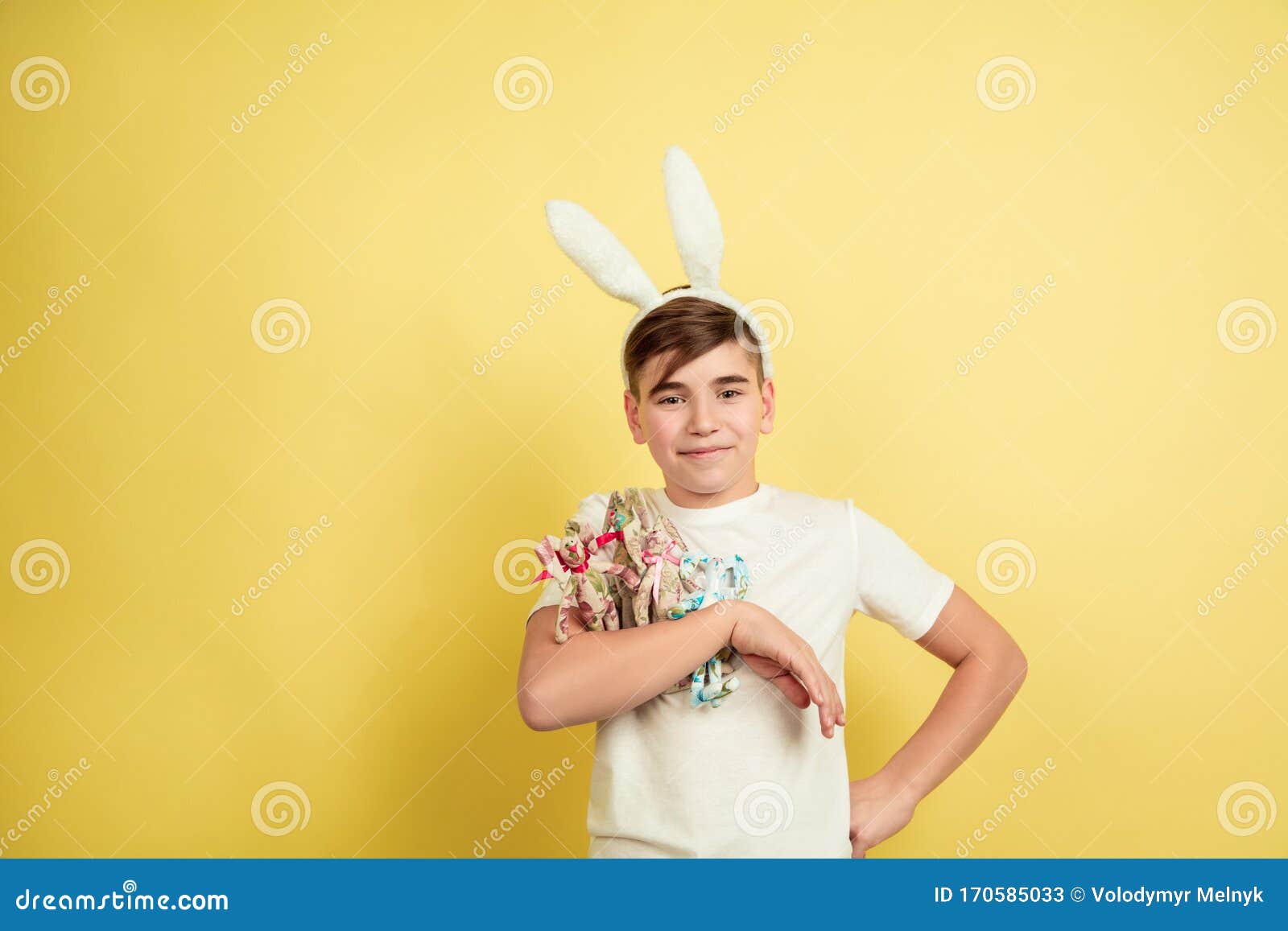 Easter Bunny Boy with Bright Emotions on Yellow Studio Background Stock ...