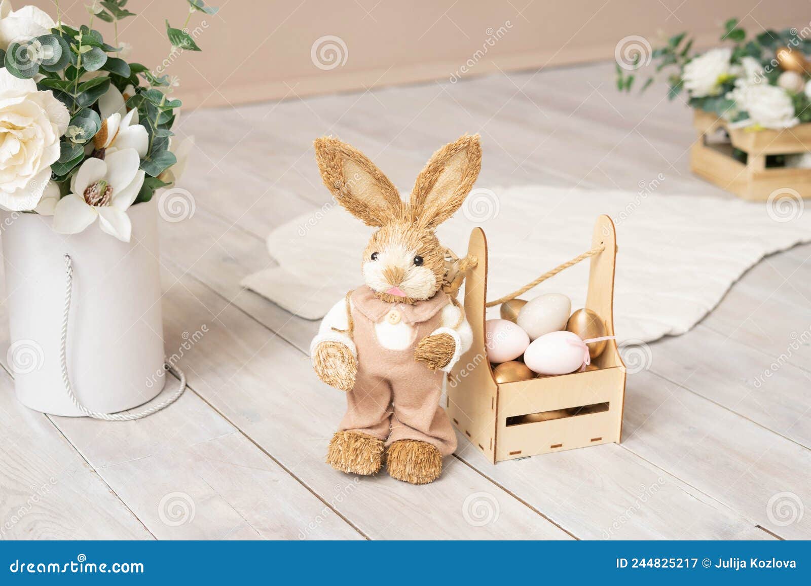 Easter Bunny in Overalls, Eggs, Flowers and a Nest Stock Image Image