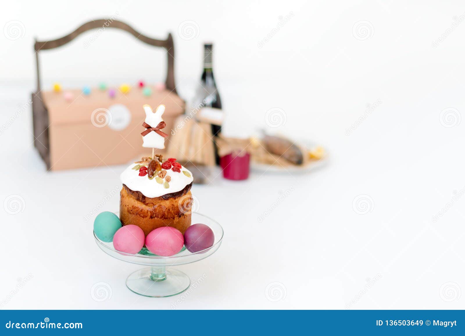 Easter Cake, Colored Eggs and Bottle of Red Wine. Easter Composition
