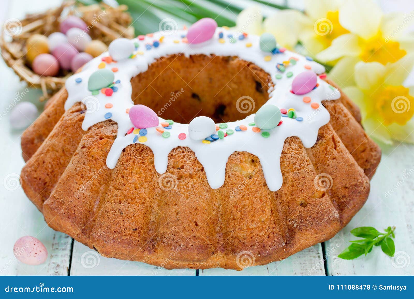 Easter Cake Decorated with Frosting, Sugar Confetti Sprinkles an Stock
