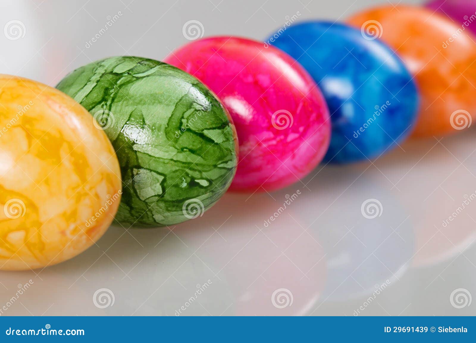 Easter Colored Eggs on White Stock Image - Image of lying, eggs: 29691439