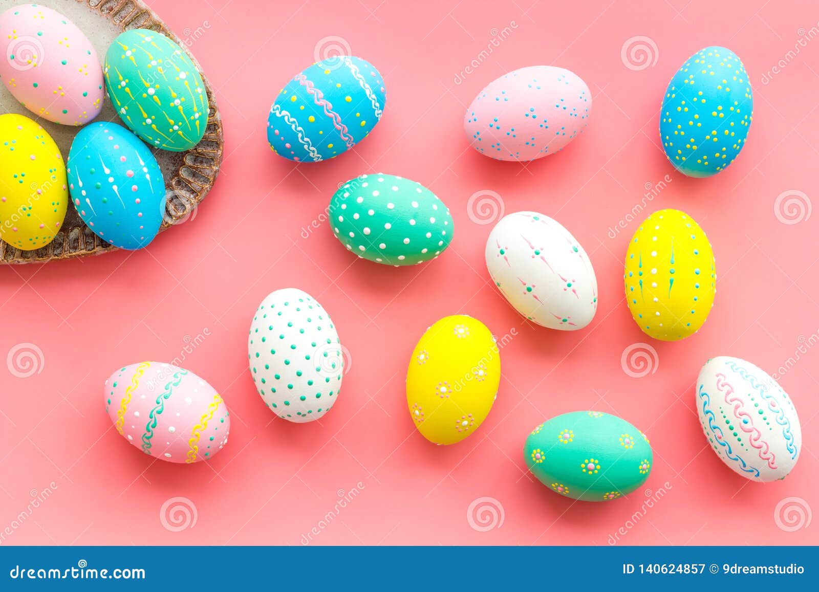 Easter Composition. Decorated Pastel Easter Eggs on Pink Background