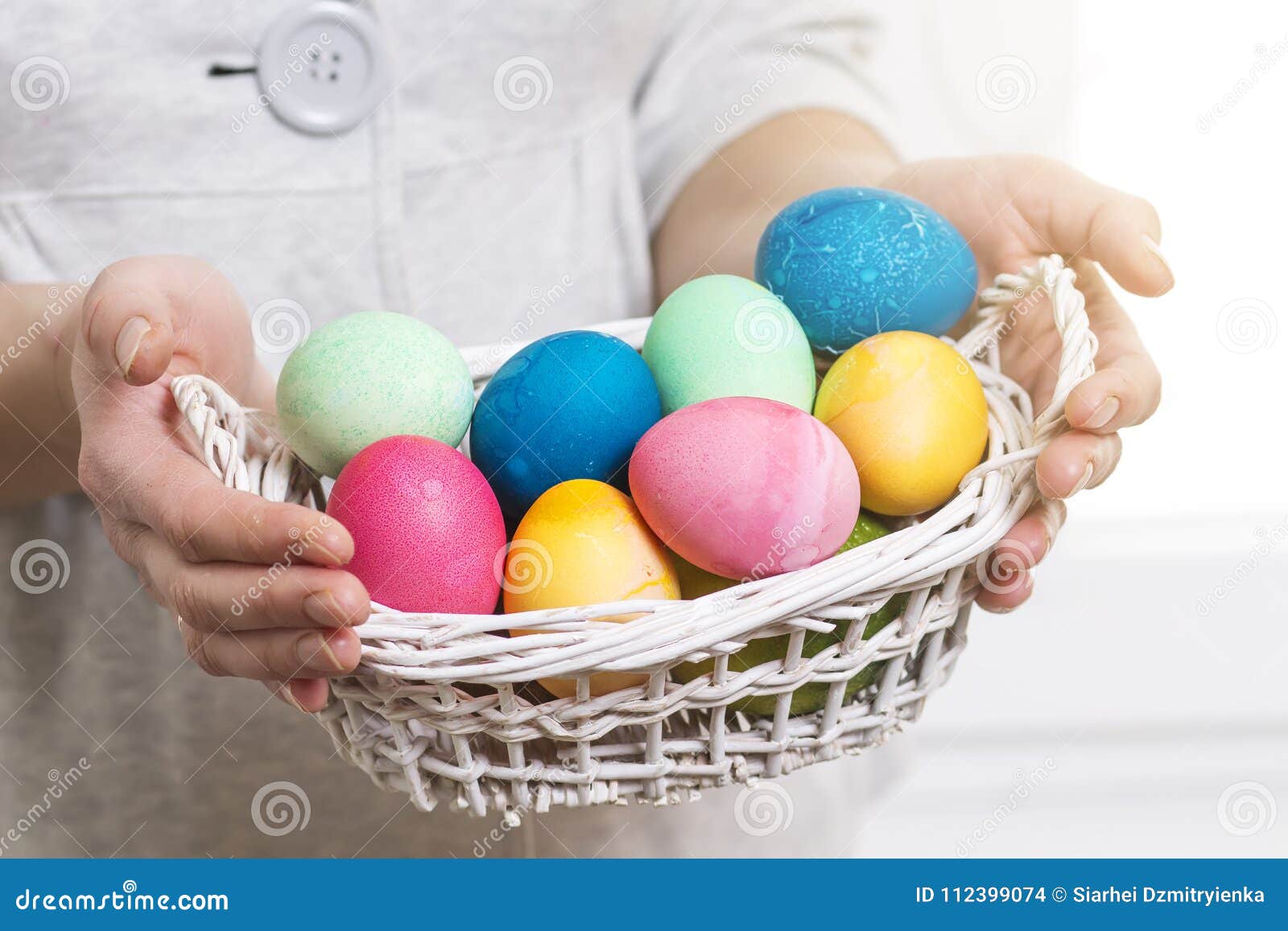 Easter Concept. a Woman Holds Basket with Colorful Colored Eggs for ...